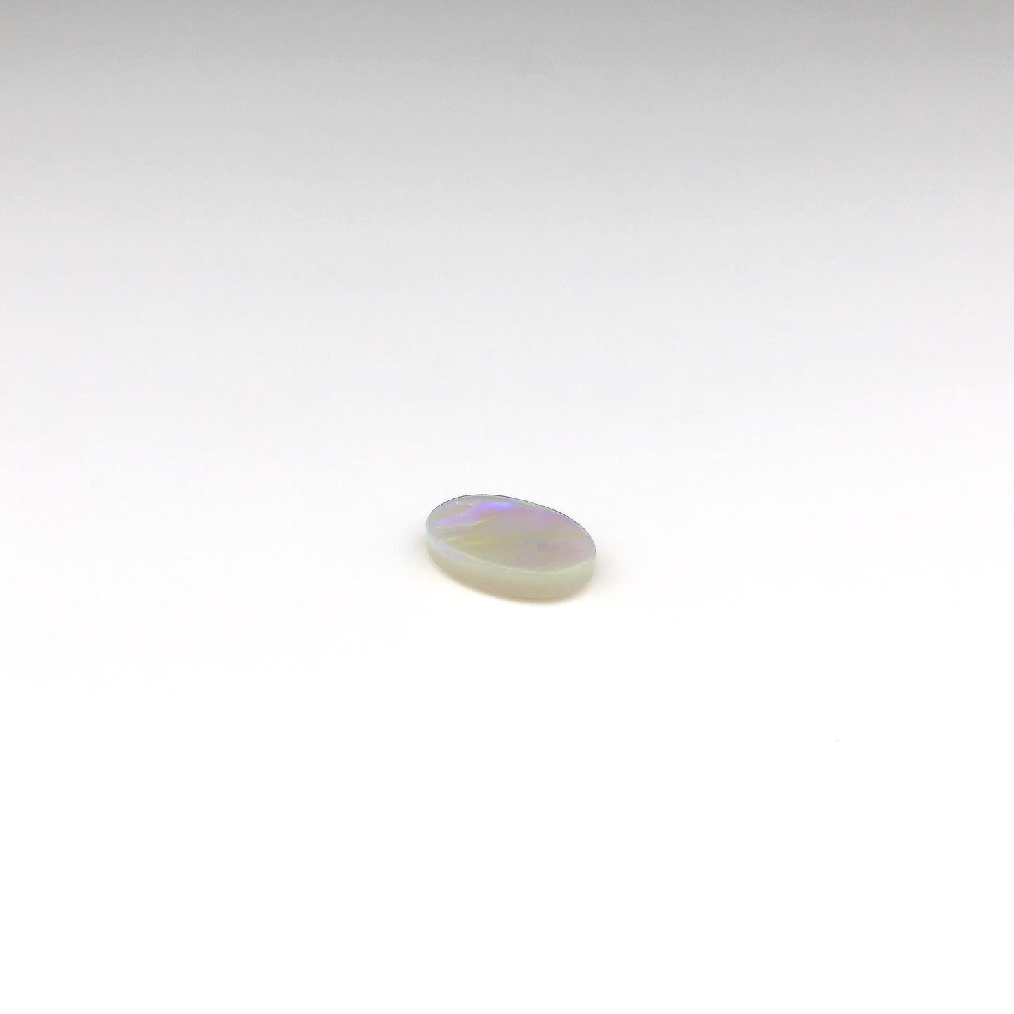 0.77ct Green, Orange Opal Gemstone