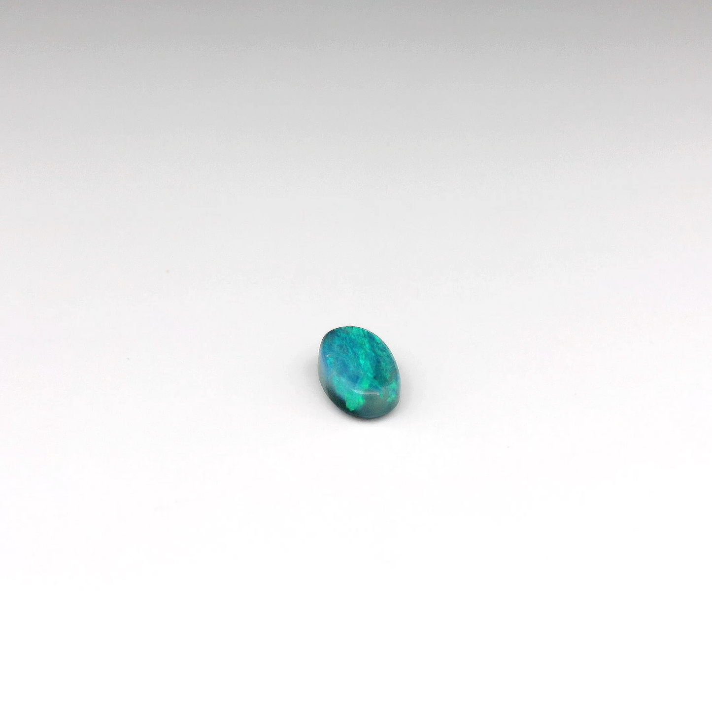 0.82ct Green, Blue Opal Gemstone