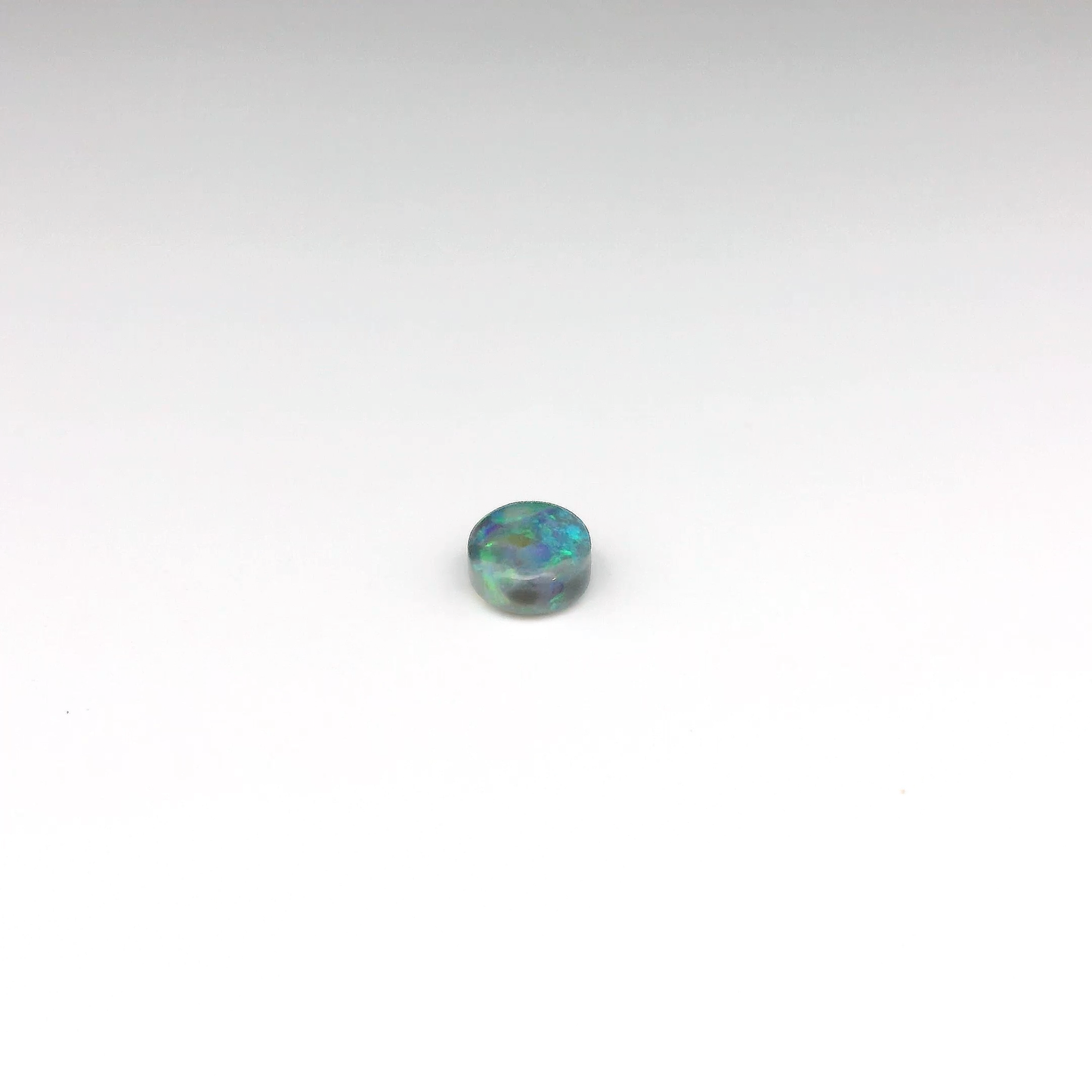 0.61ct Green, Orange Opal Gemstone