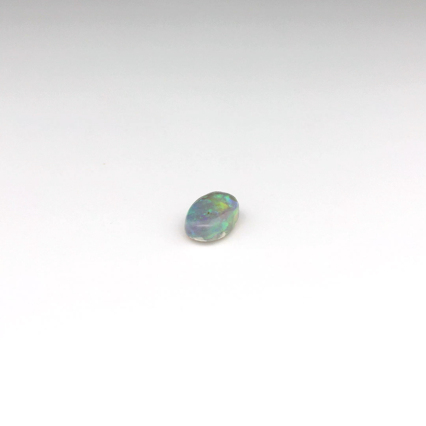 0.9ct Green, Orange Opal Gemstone
