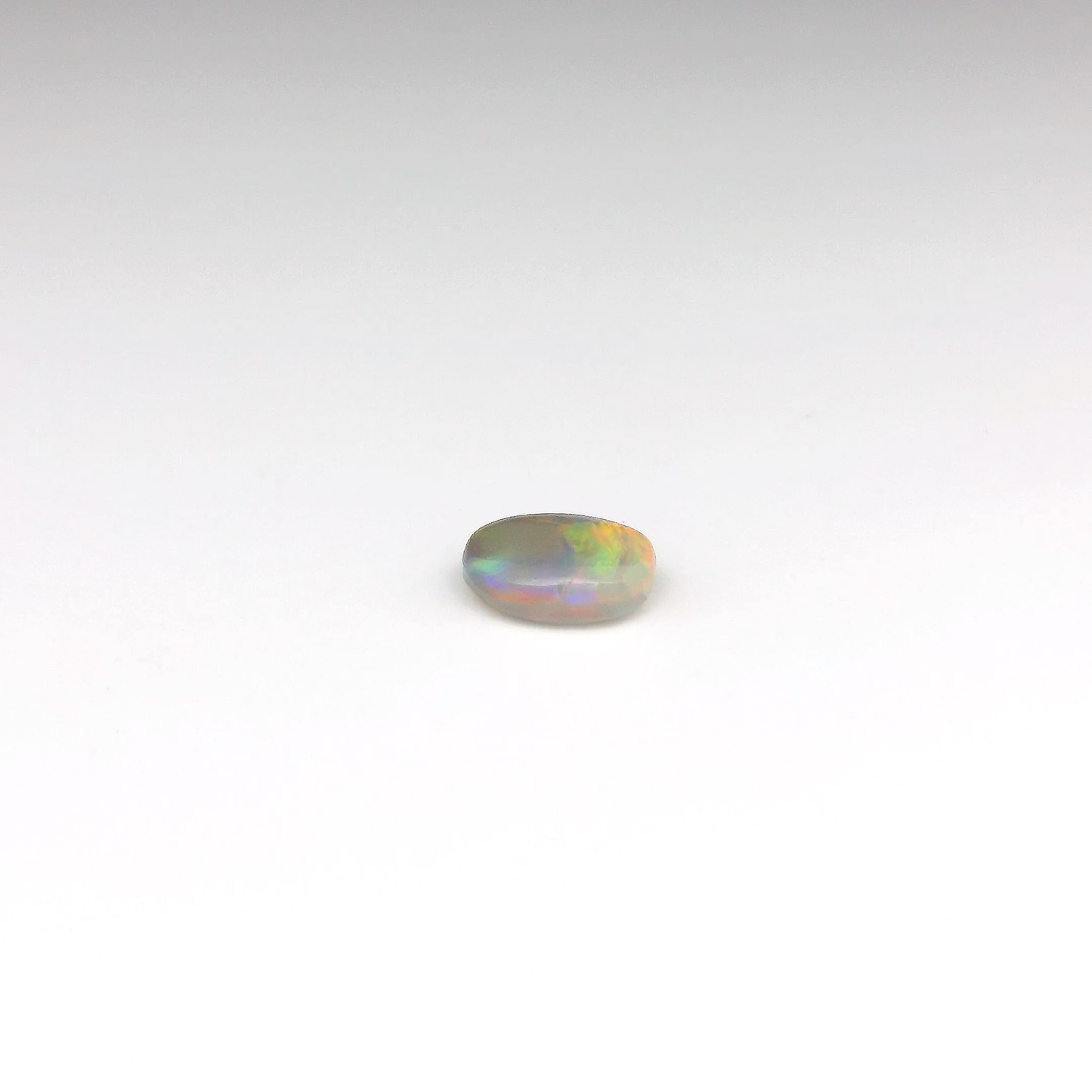 0.94ct Red, Multicolour Opal Gemstone