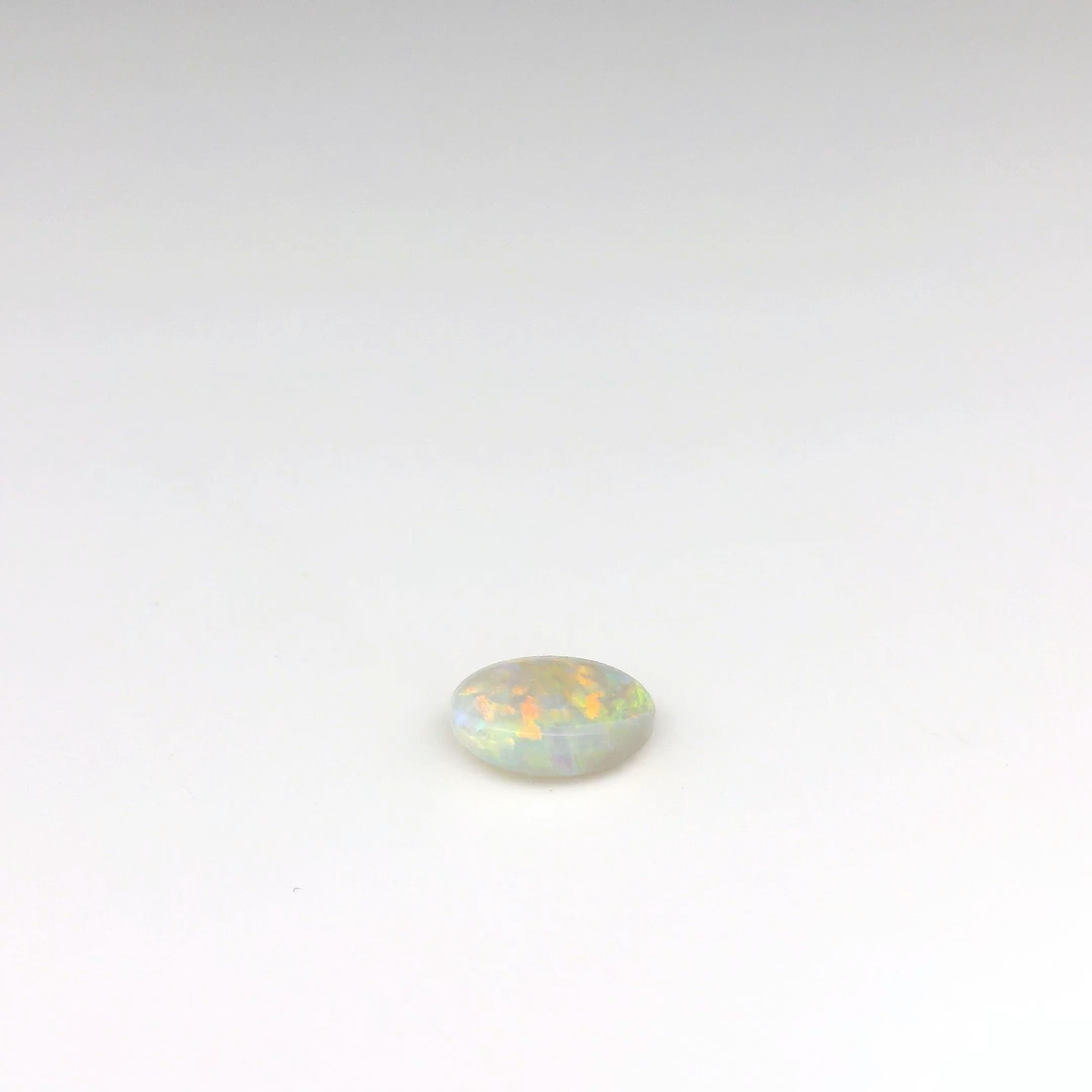 0.8 Orange Multicolour Opal Gemstone