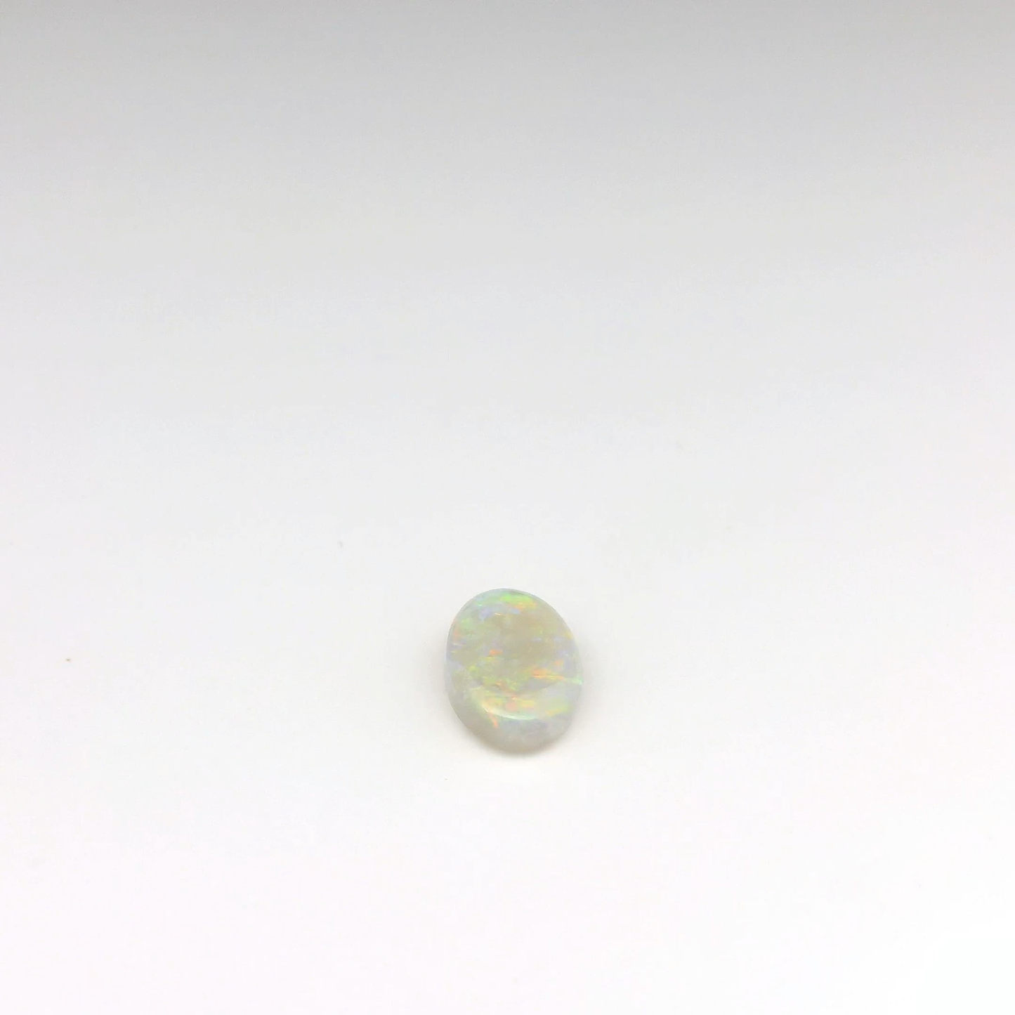 0.8 Orange Multicolour Opal Gemstone