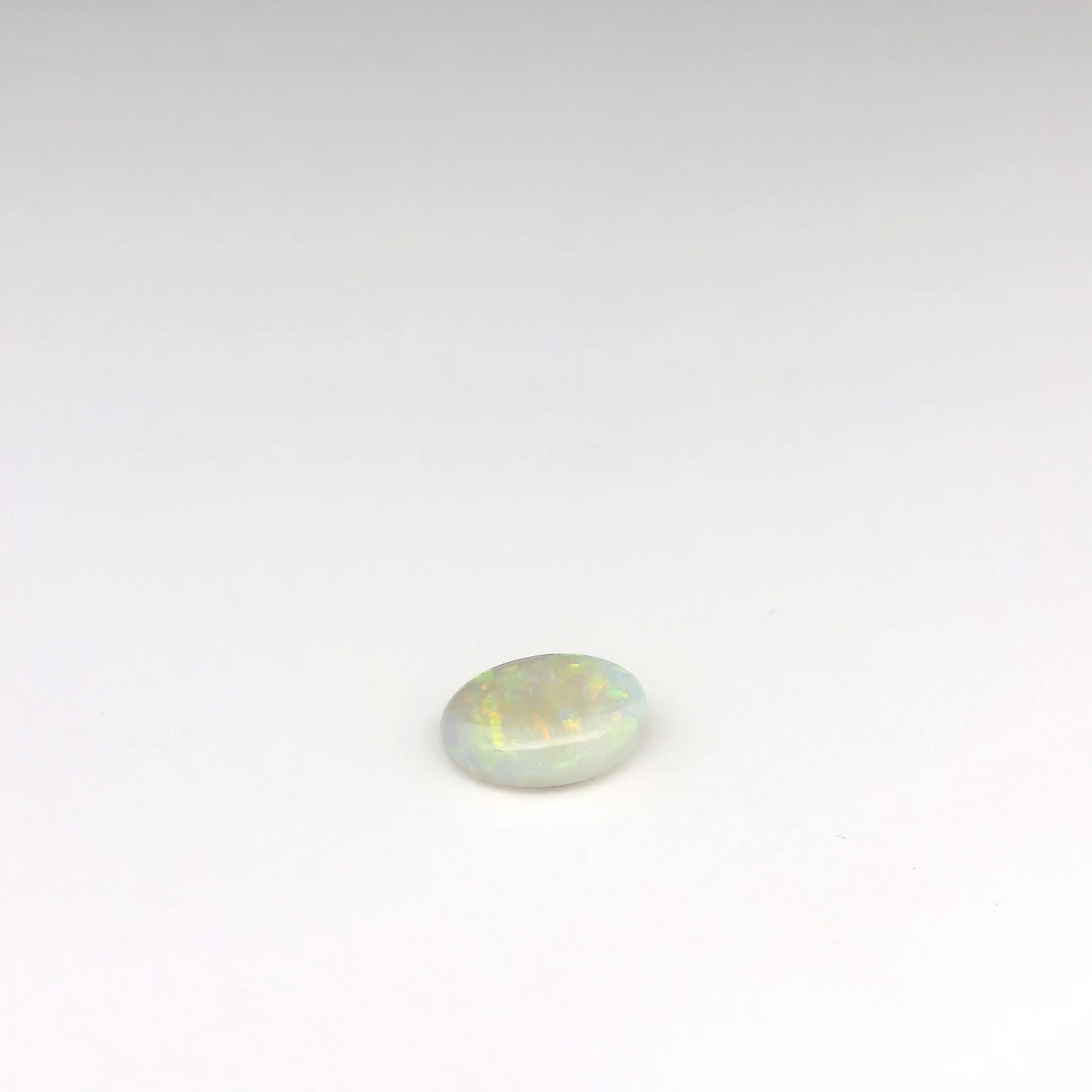 0.8 Orange Multicolour Opal Gemstone