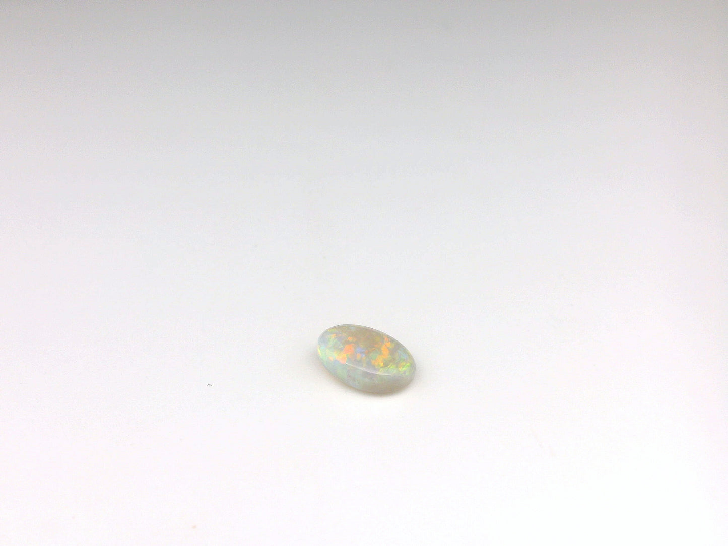 0.8 Orange Multicolour Opal Gemstone