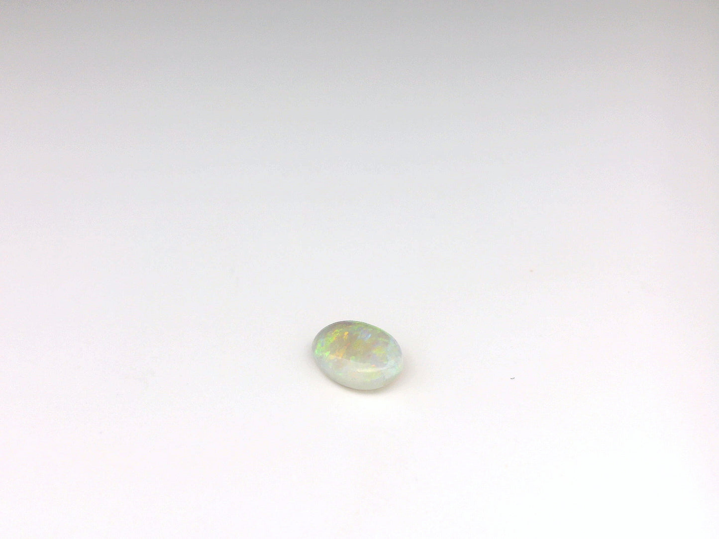 0.8 Orange Multicolour Opal Gemstone