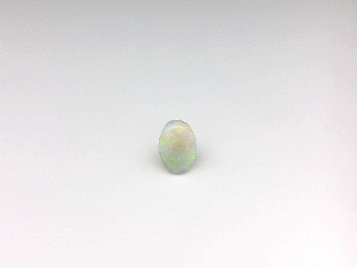 0.8 Orange Multicolour Opal Gemstone