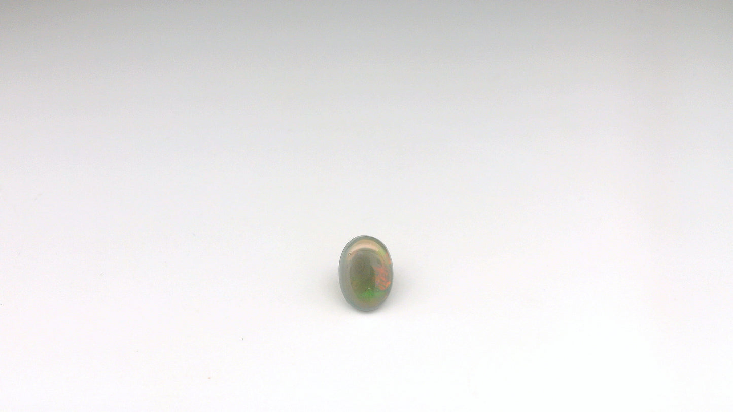 0.96ct Red, Green Opal Gemstone
