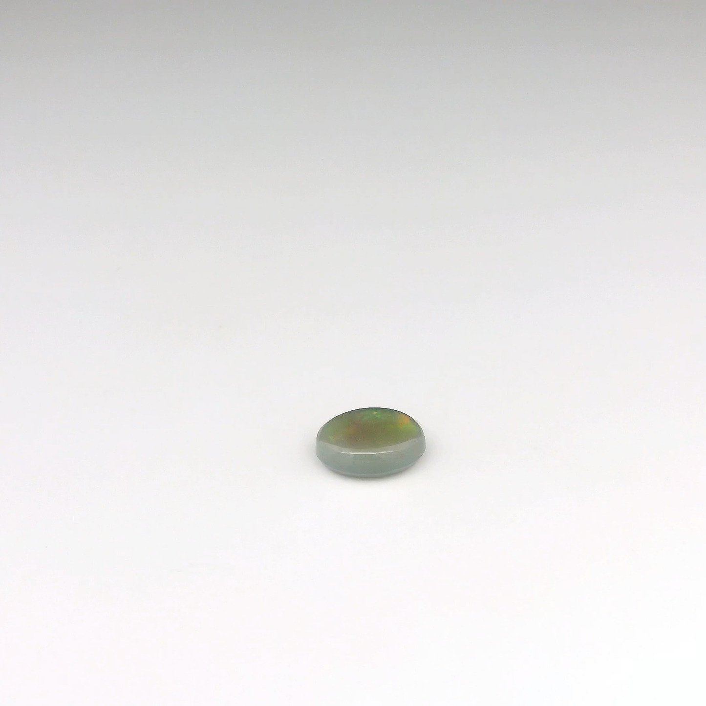 0.96ct Red, Green Opal Gemstone