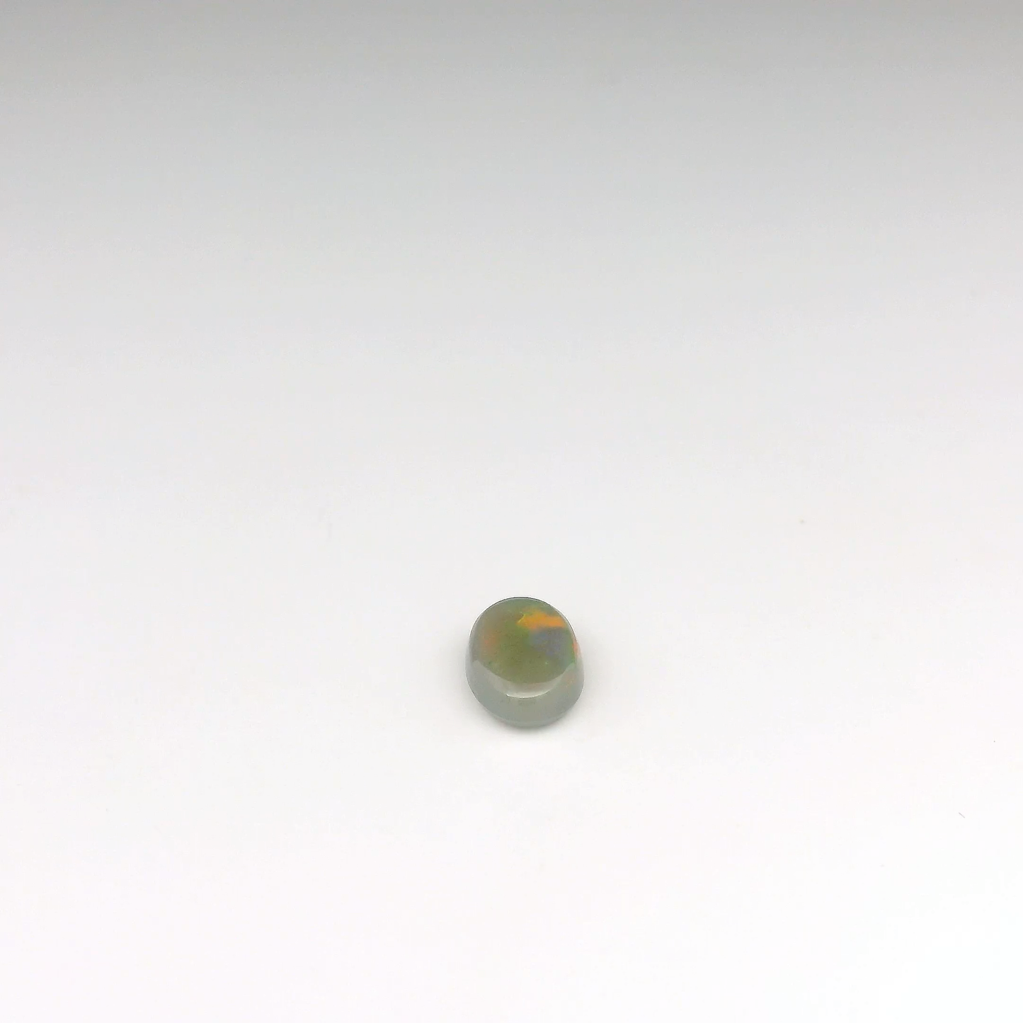 0.96ct Red, Green Opal Gemstone