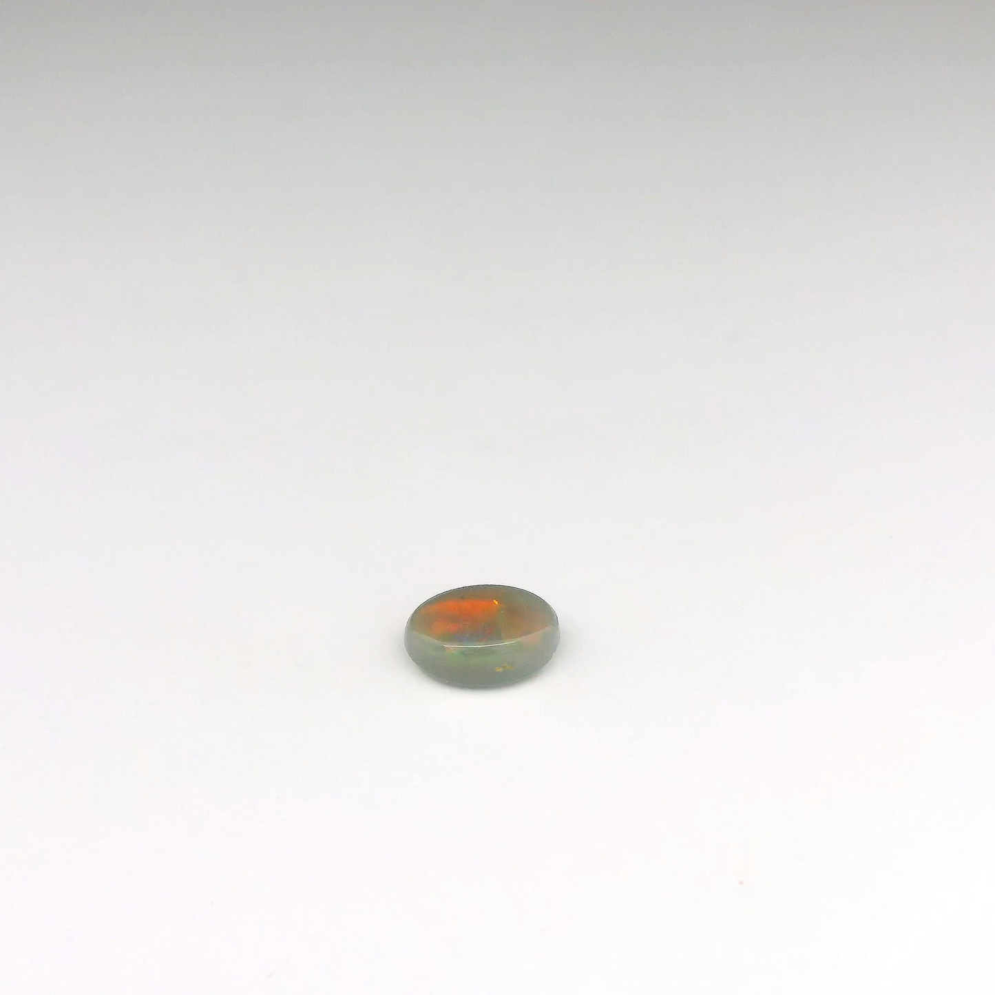0.96ct Red, Green Opal Gemstone