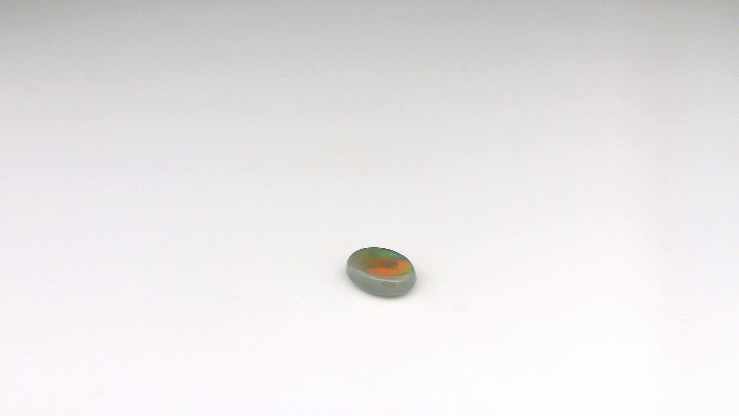 0.96ct Red, Green Opal Gemstone