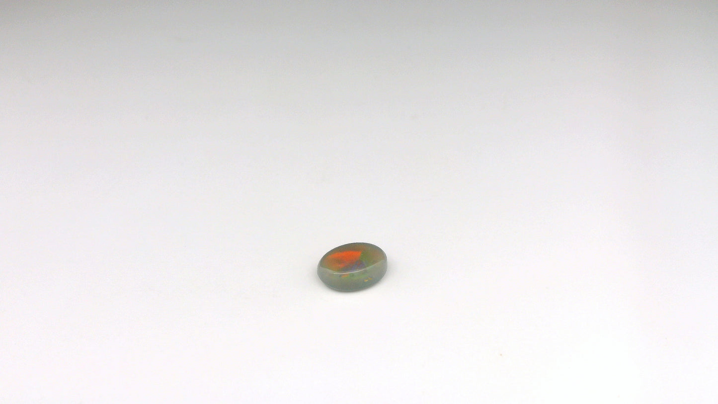 0.96ct Red, Green Opal Gemstone