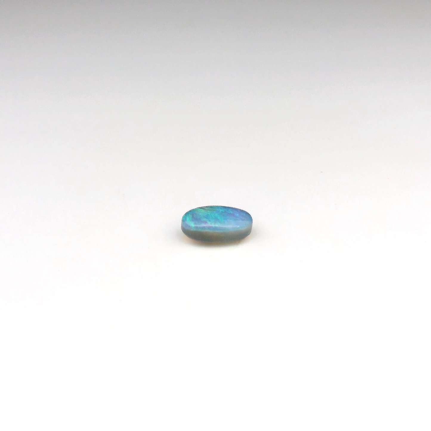 0.90ct Green, Blue Opal Gemstone