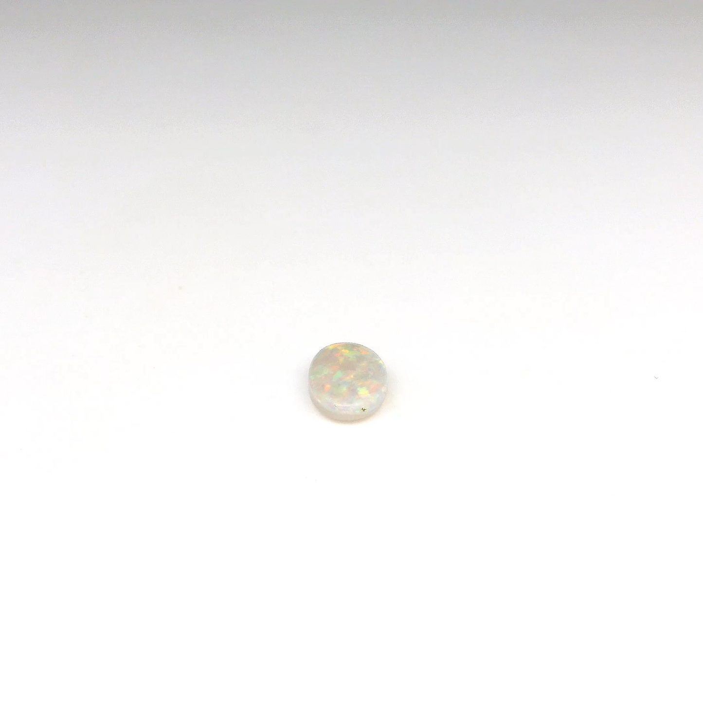 0.69ct Green, Orange Opal Gemstone