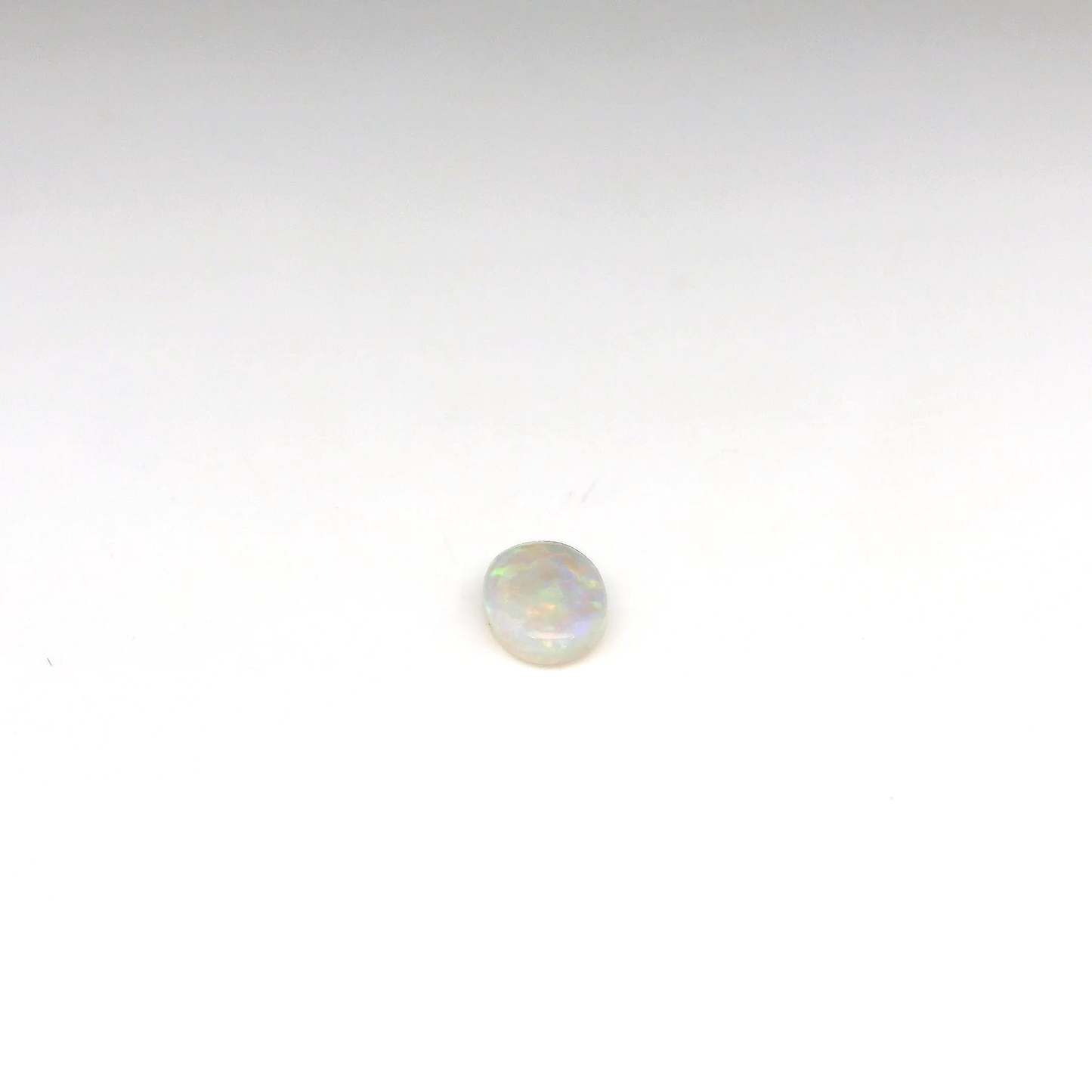 0.69ct Green, Orange Opal Gemstone