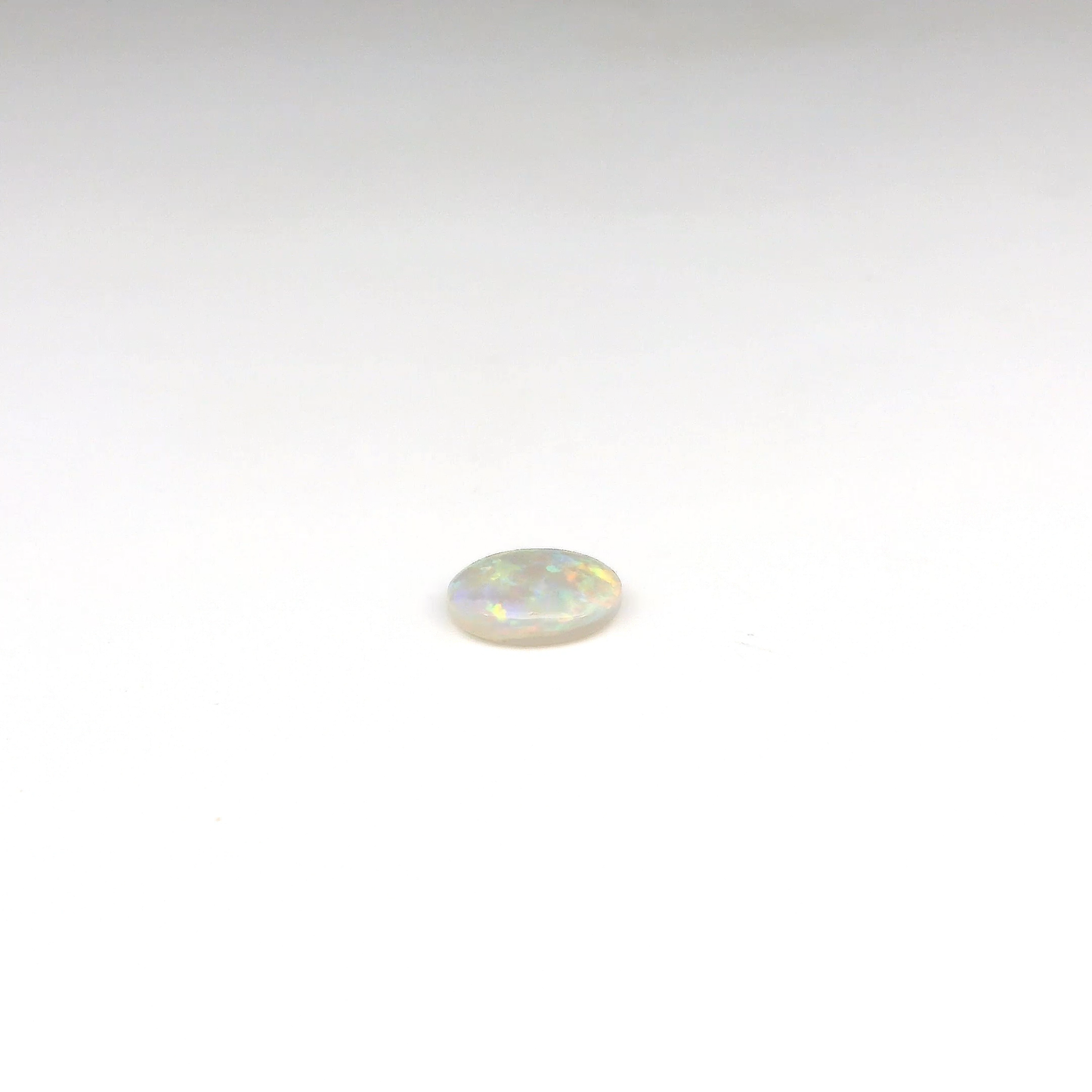 0.69ct Green, Orange Opal Gemstone
