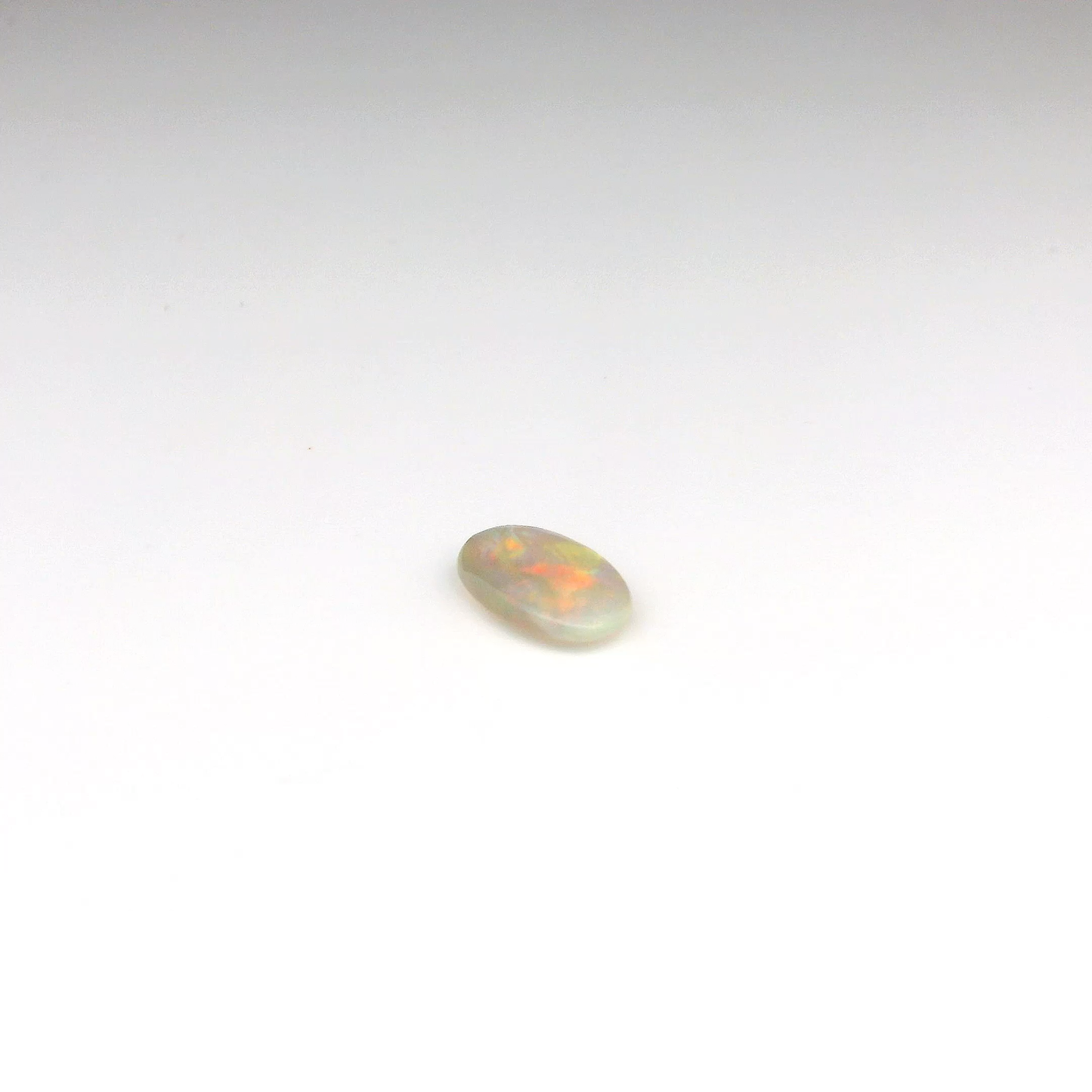 0.93ct Red Multicolour Opal Gemstone