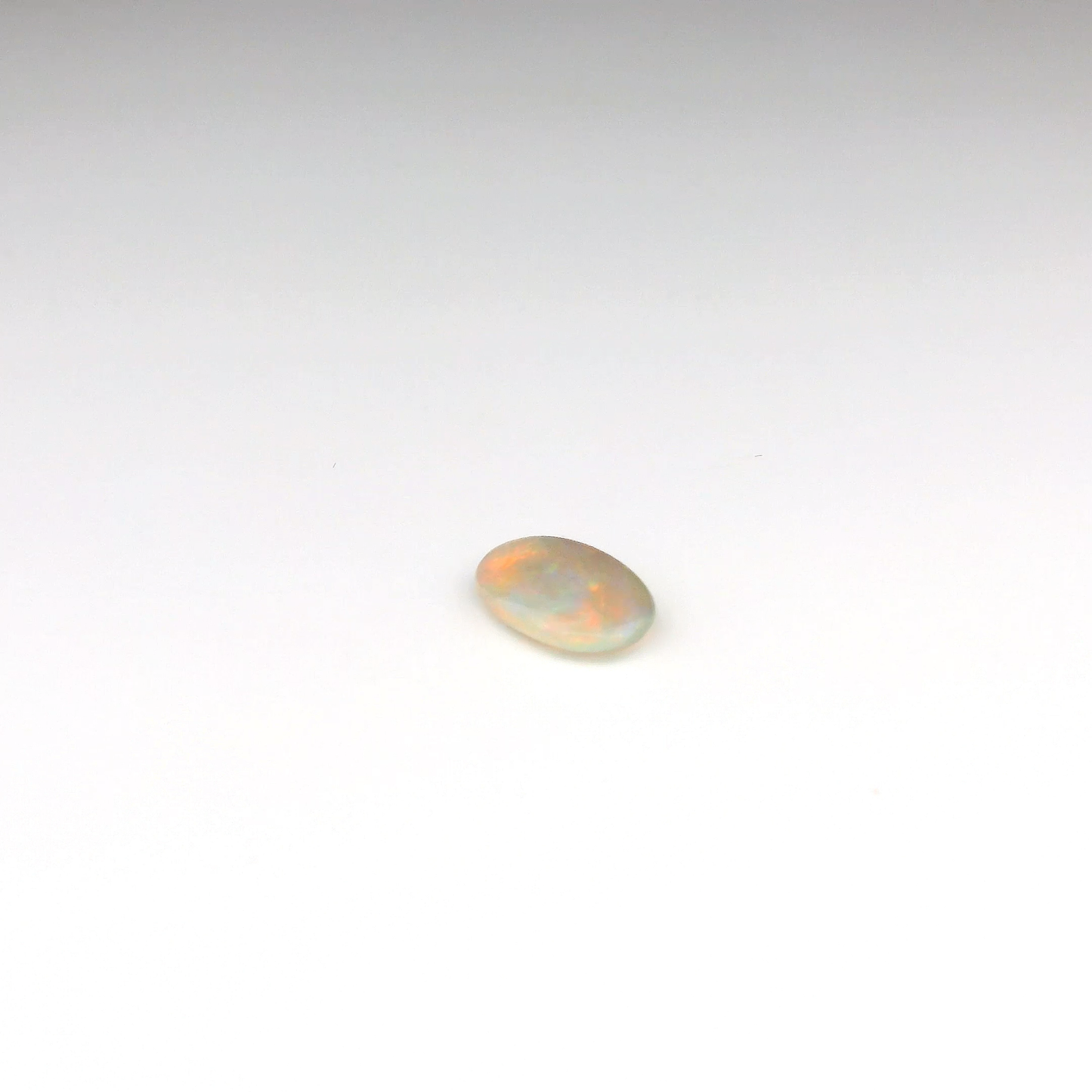 0.93ct Red Multicolour Opal Gemstone