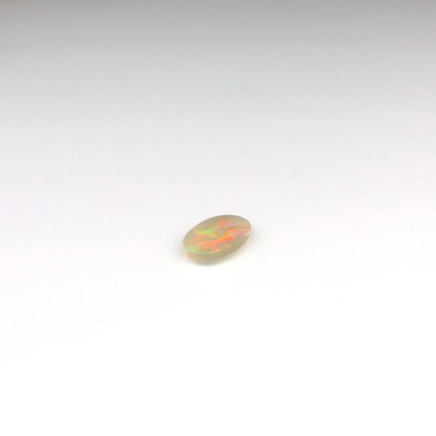 0.93ct Red Multicolour Opal Gemstone