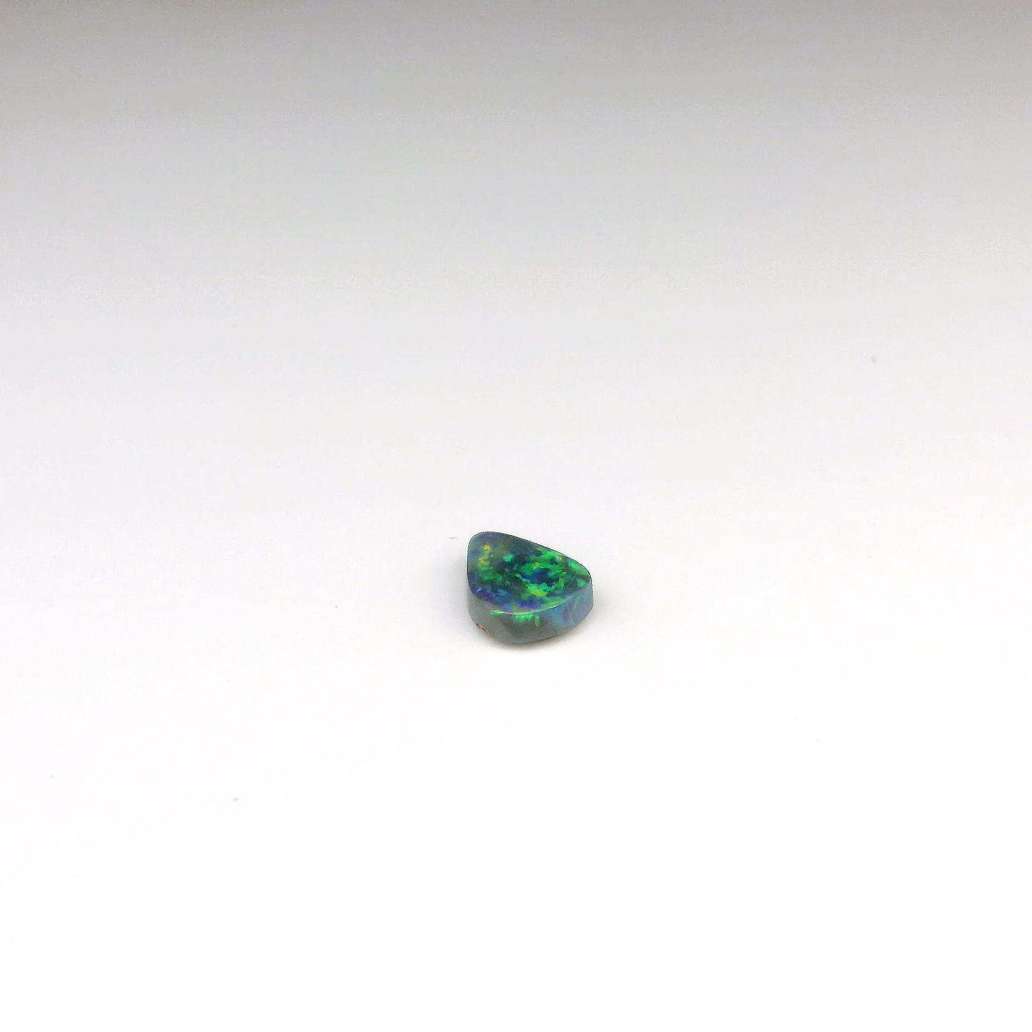 0.77ct Green, Orange Opal Gemstone