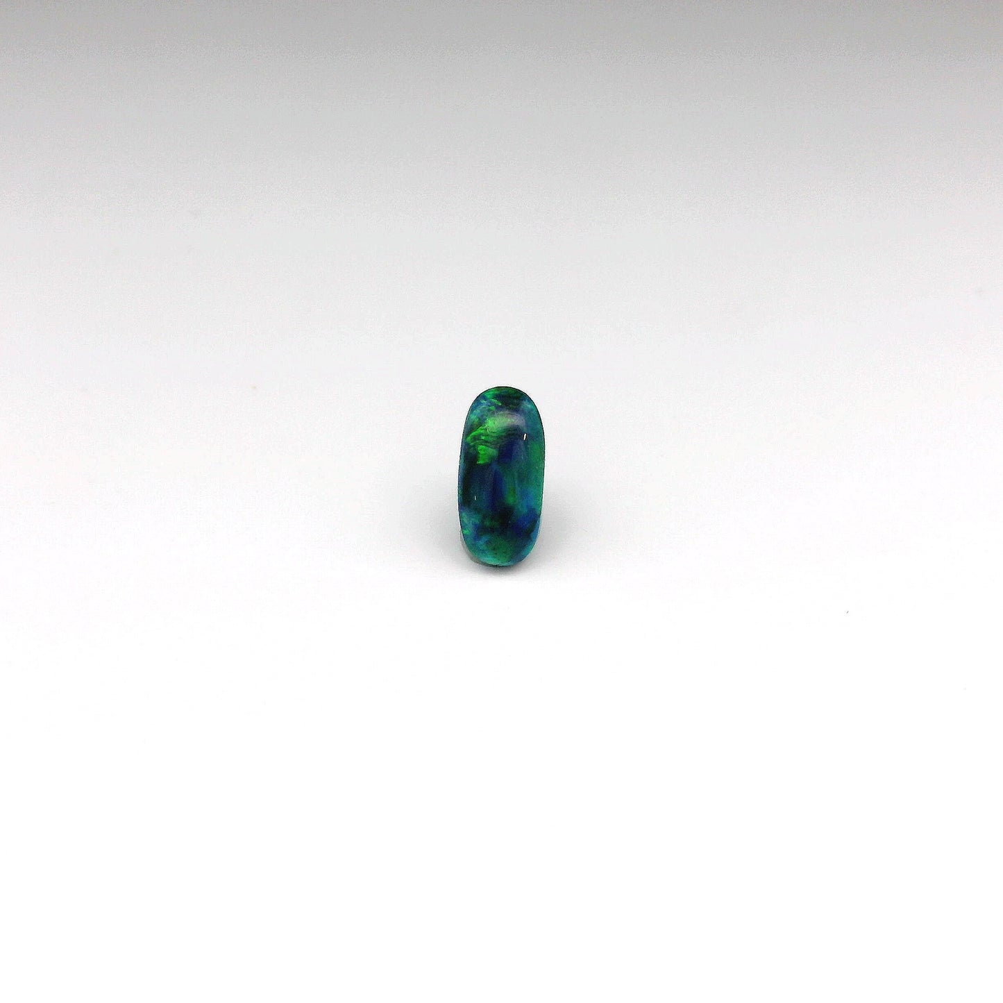 0.73ct Green, Orange Opal Gemstone