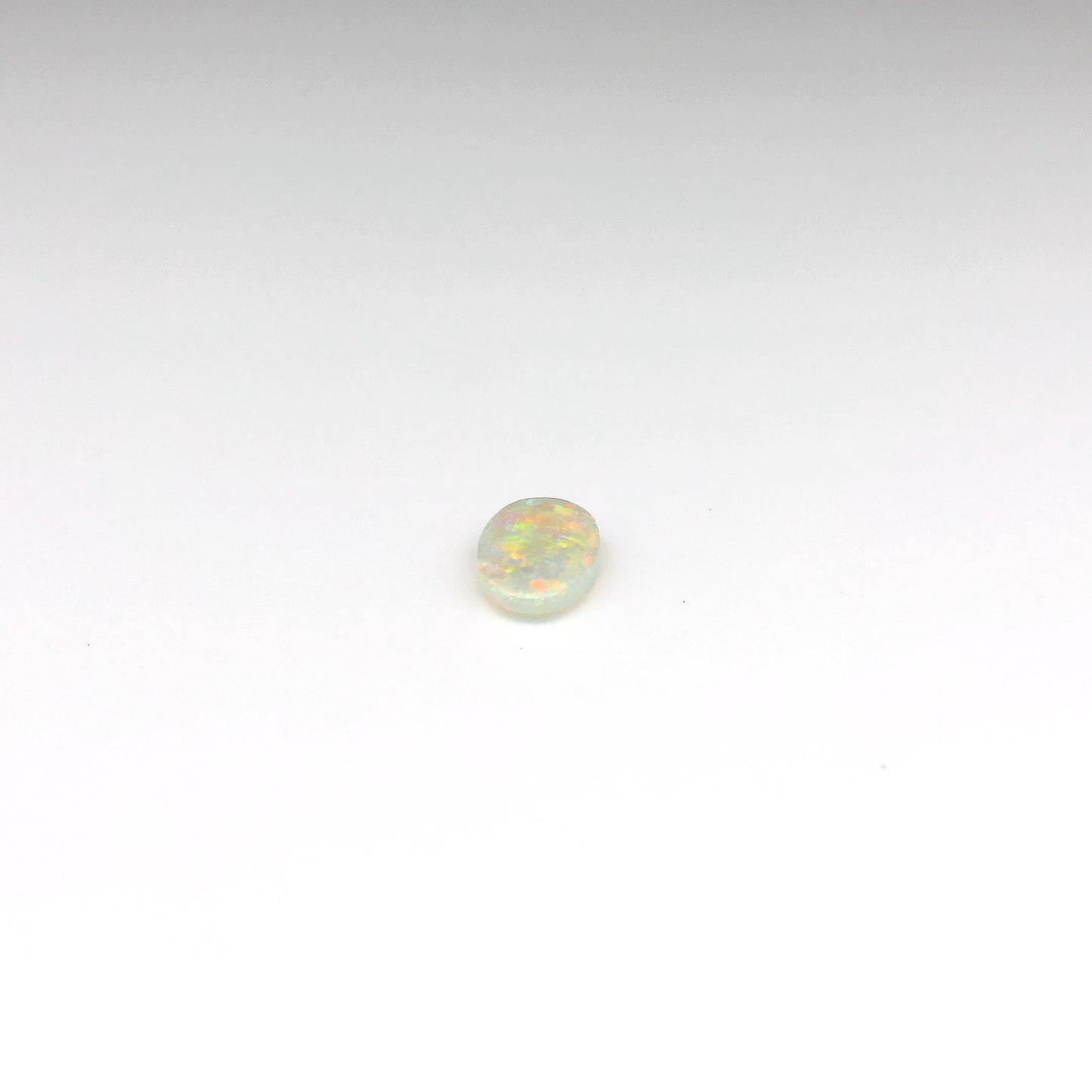 0.55ct Orange Multicolour Opal Gemstone