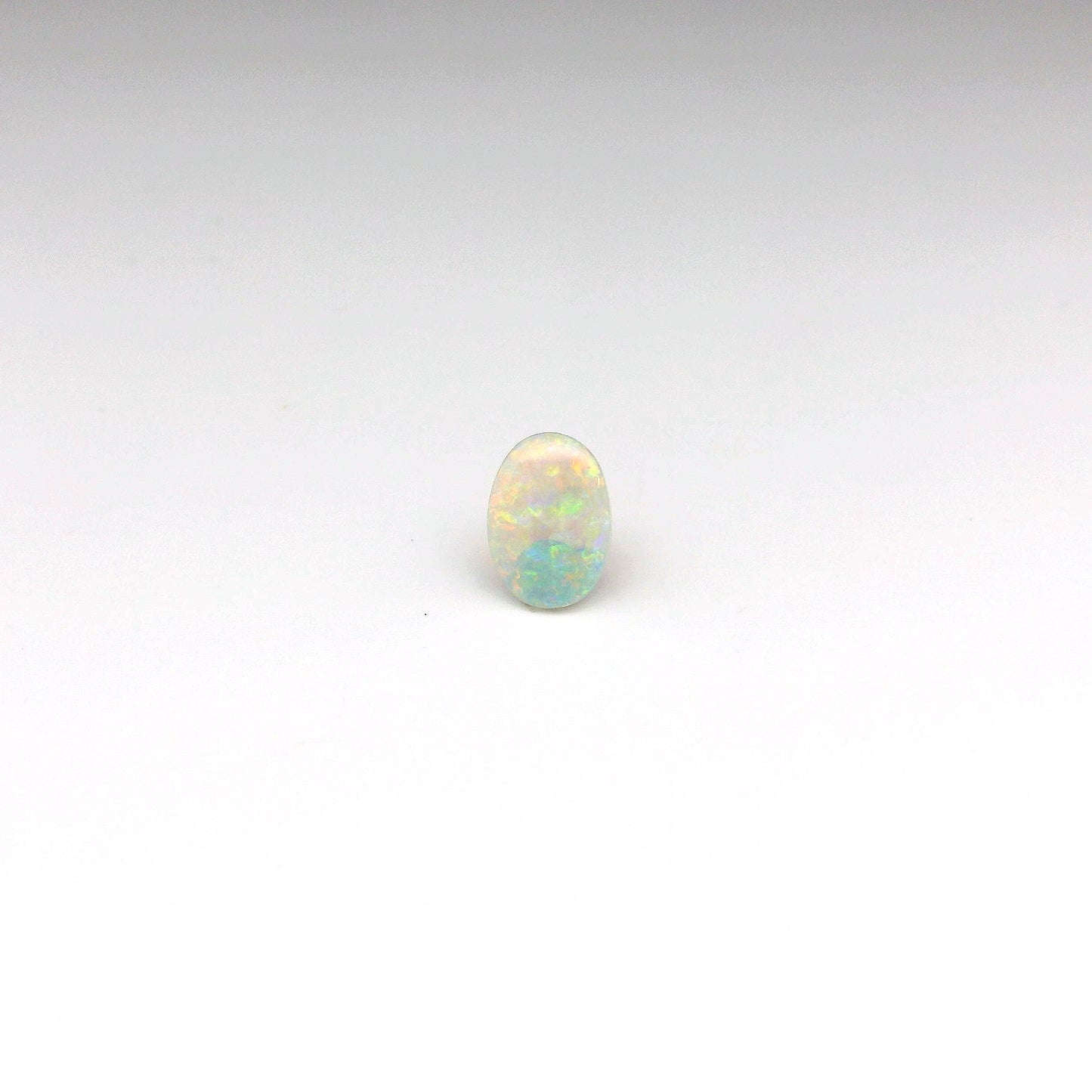 0.55ct Orange Multicolour Opal Gemstone