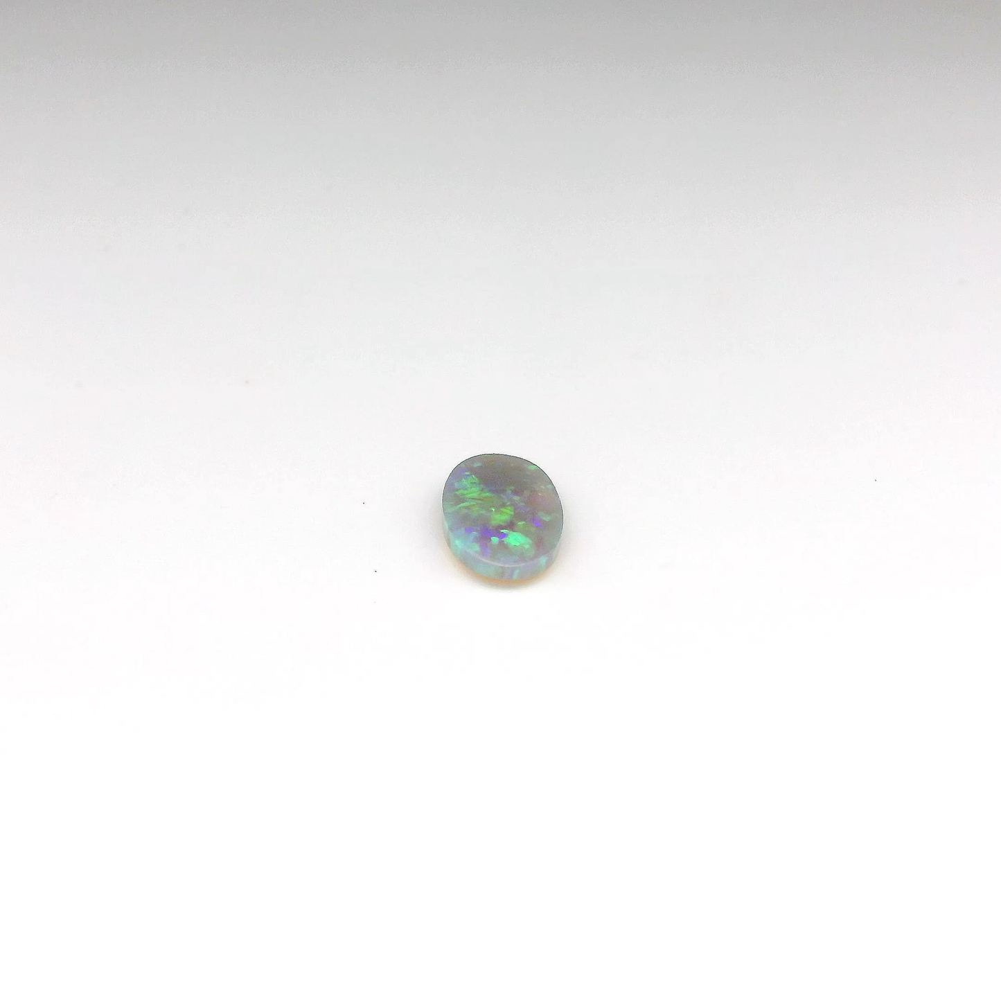 0.72ct Green, Purple Opal Gemstone