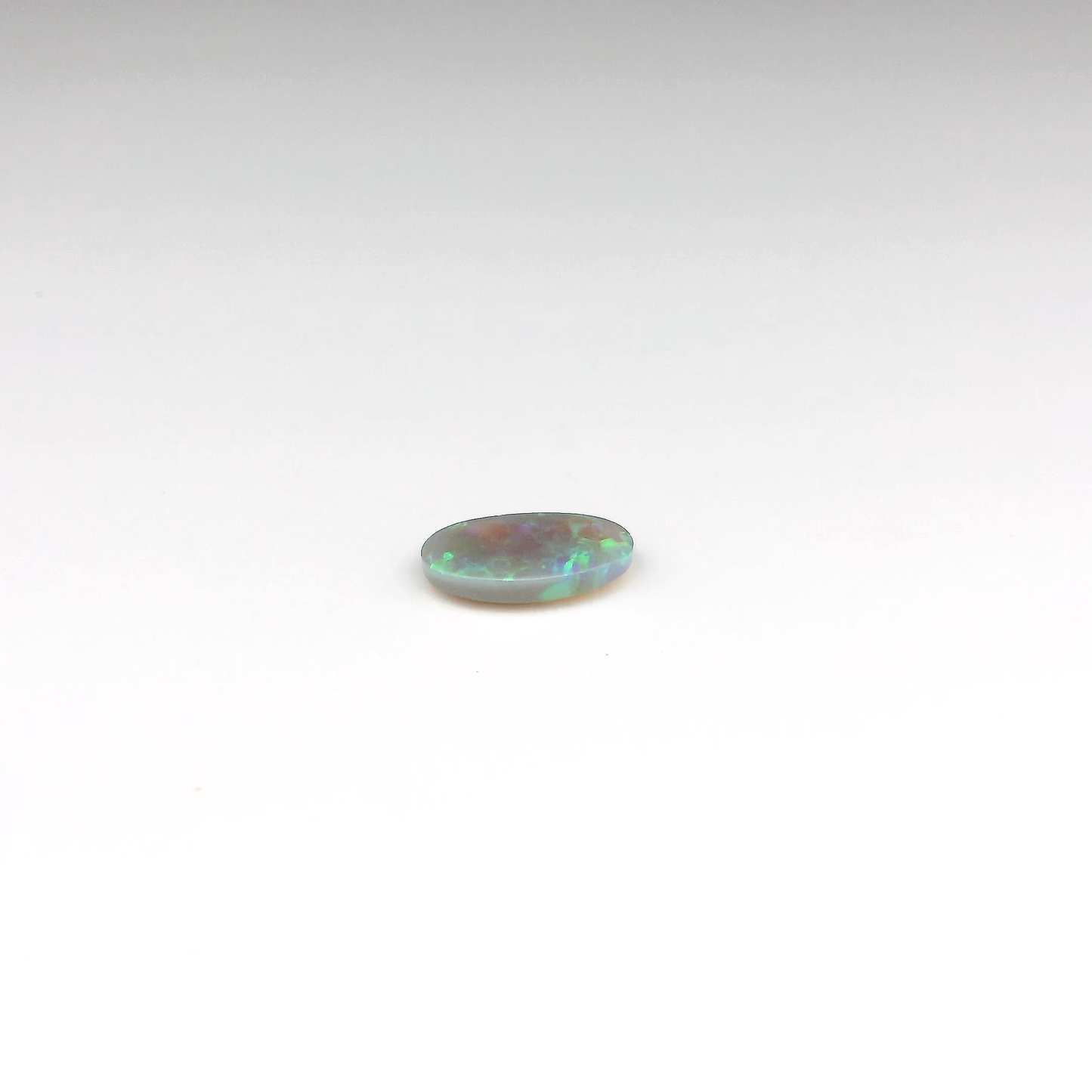0.72ct Green, Purple Opal Gemstone