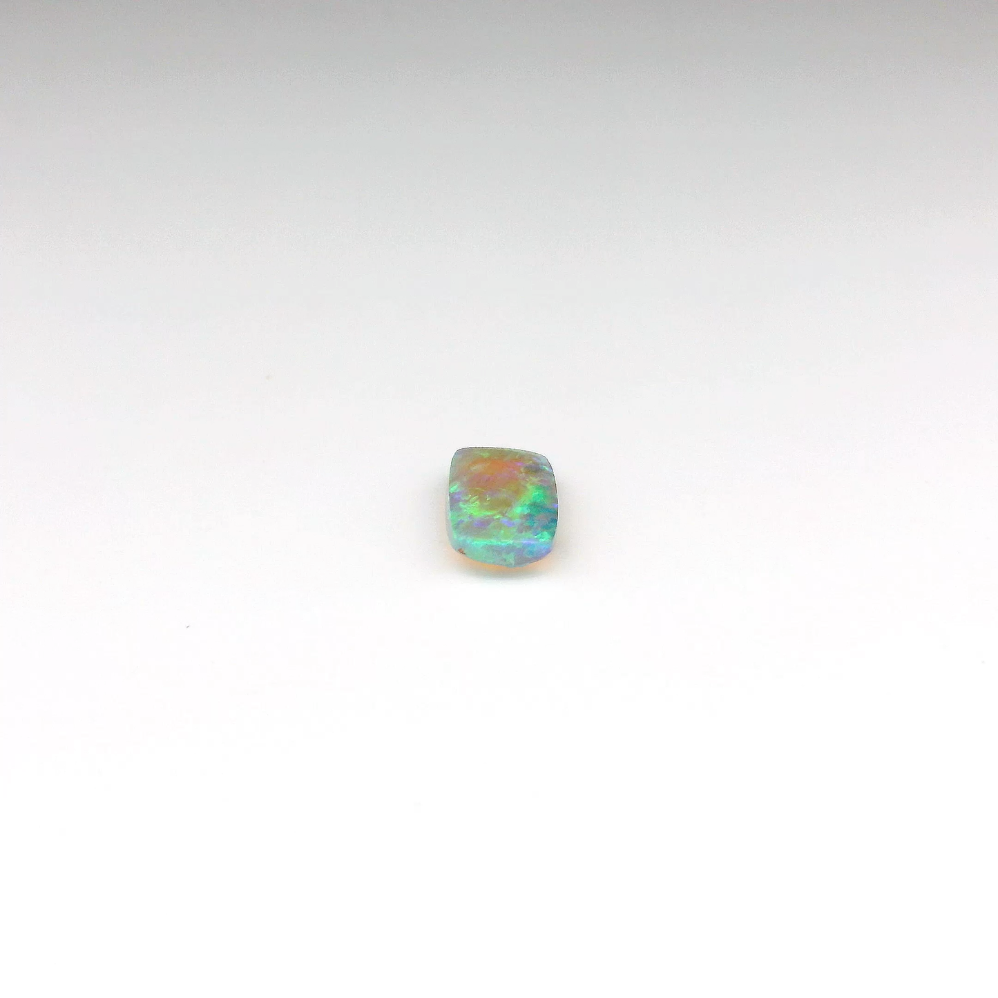 0.84 Green, Purple Opal Gemstone