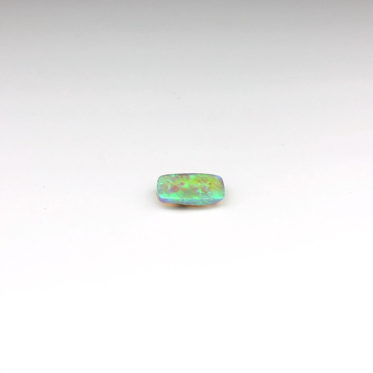 0.84 Green, Purple Opal Gemstone