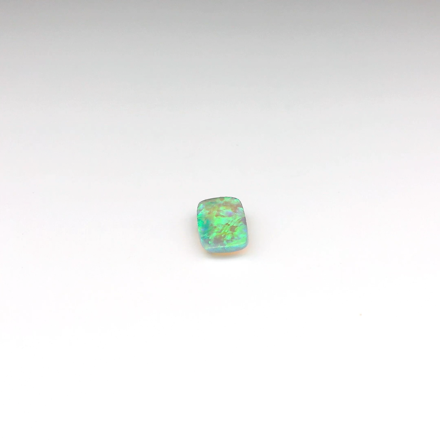 0.84 Green, Purple Opal Gemstone