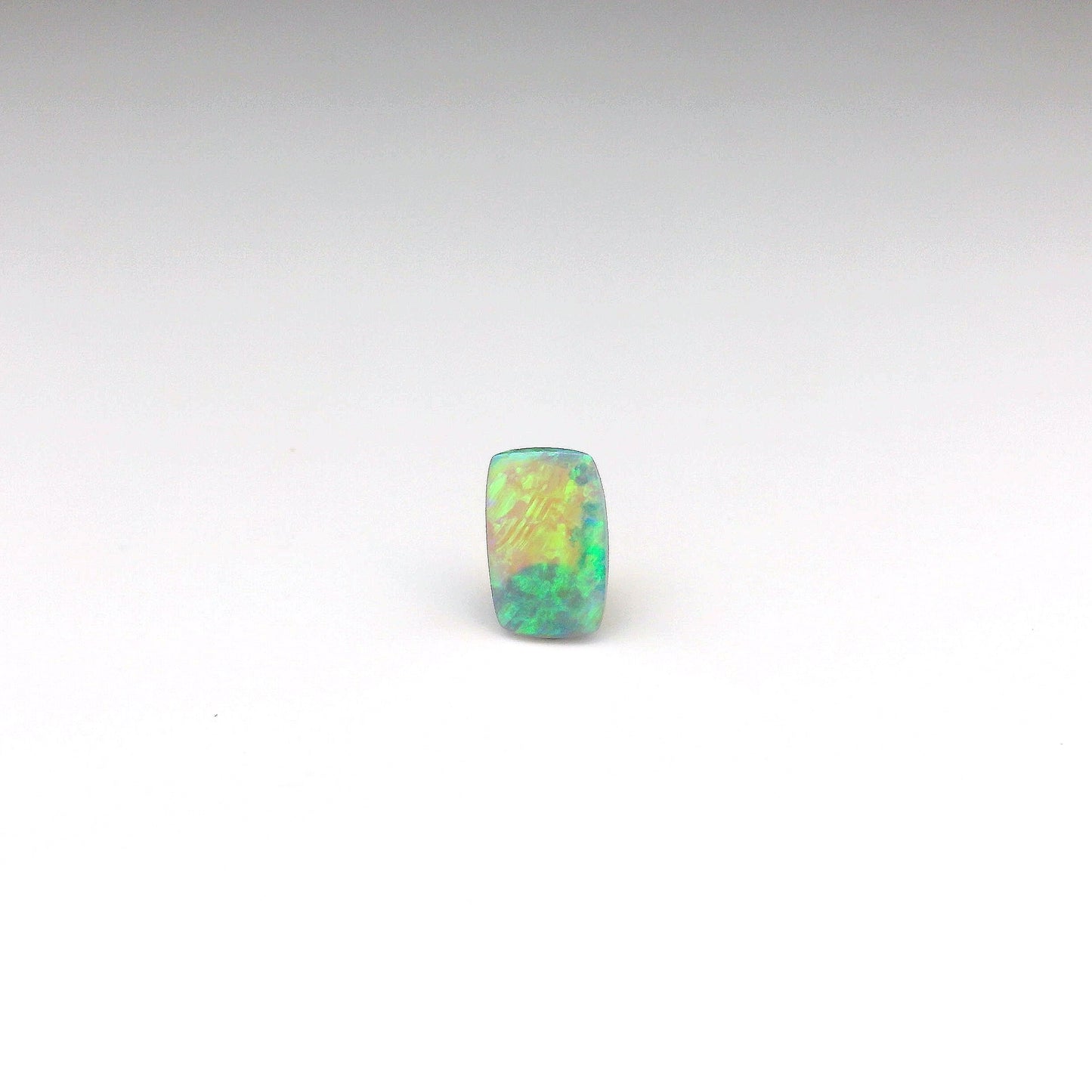 0.84 Green, Purple Opal Gemstone