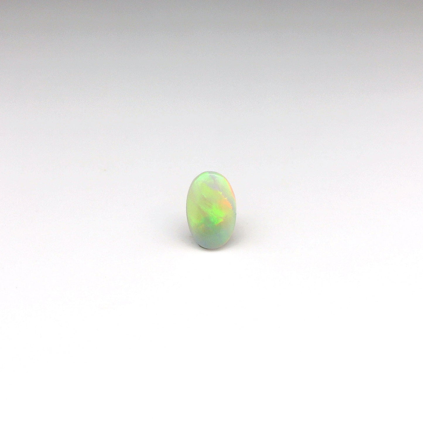 0.77ct Green, Orange Opal Gemstone