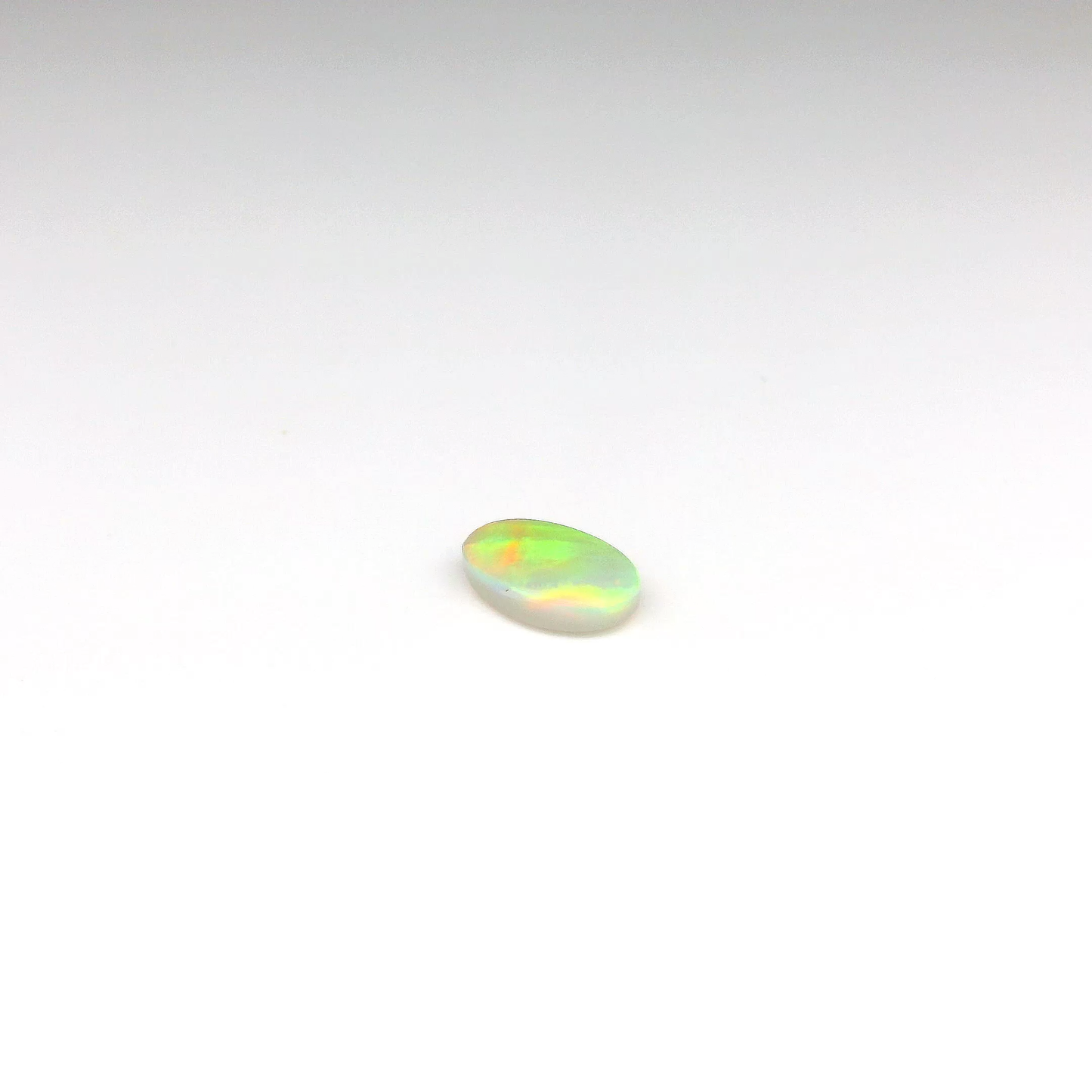0.77ct Green, Orange Opal Gemstone