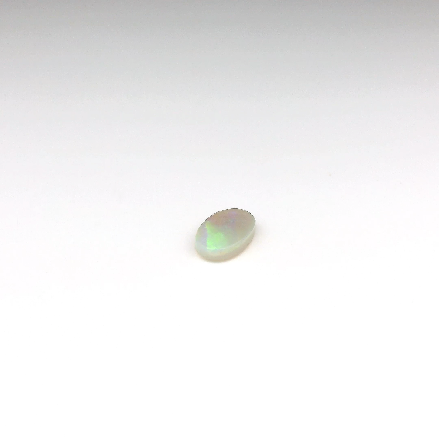 0.77ct Green, Orange Opal Gemstone