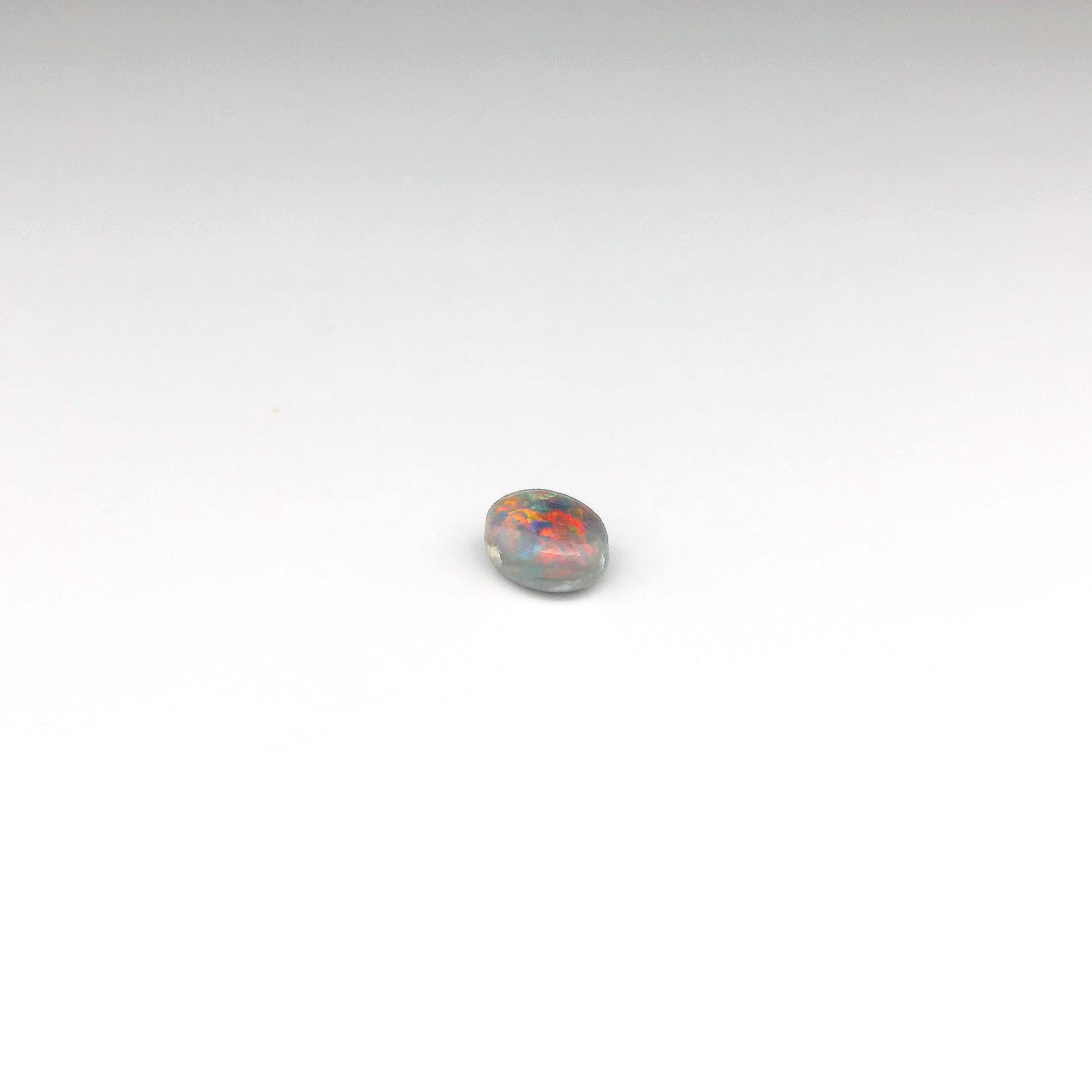 0.64ct Red Multicolour Opal Gemstone