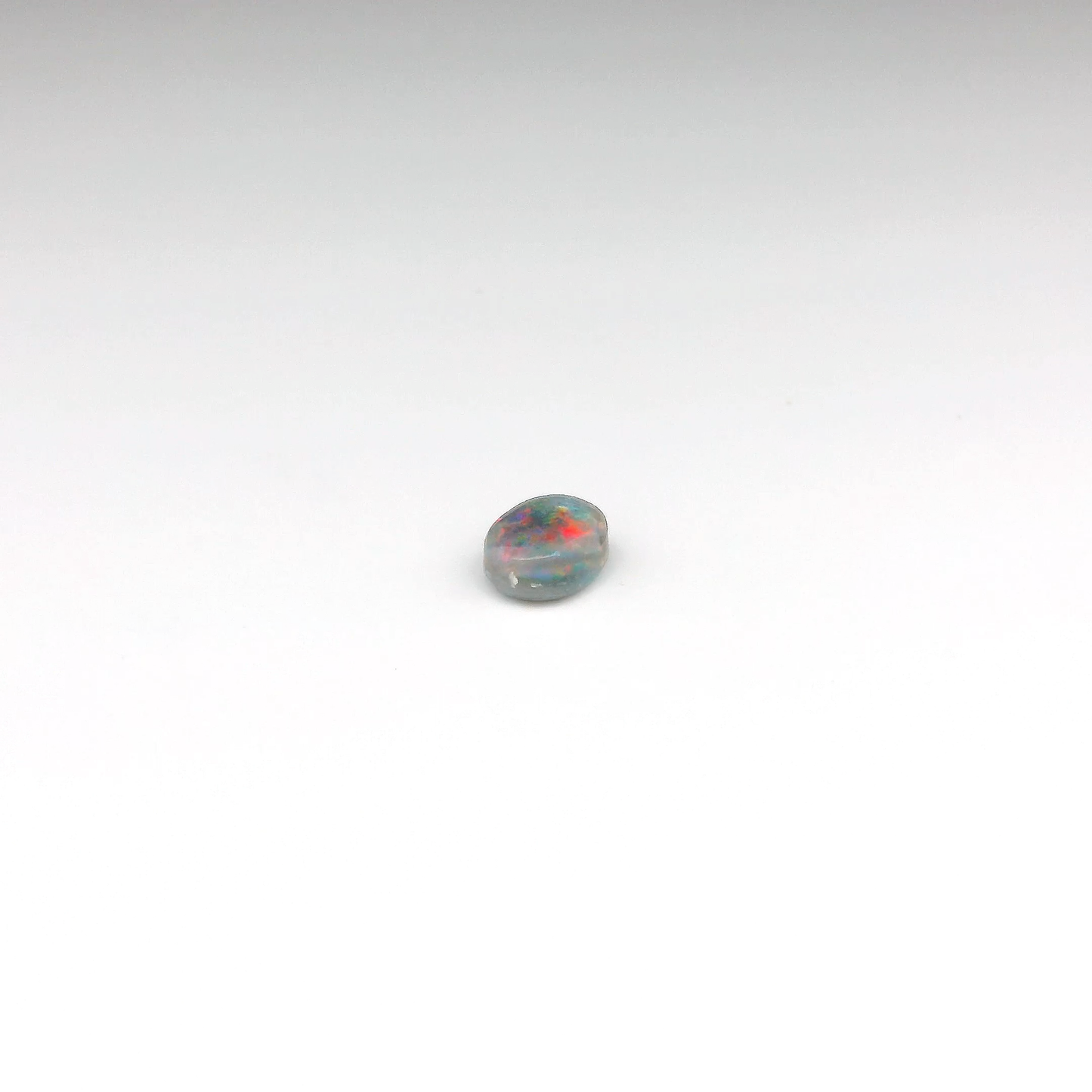 0.64ct Red Multicolour Opal Gemstone