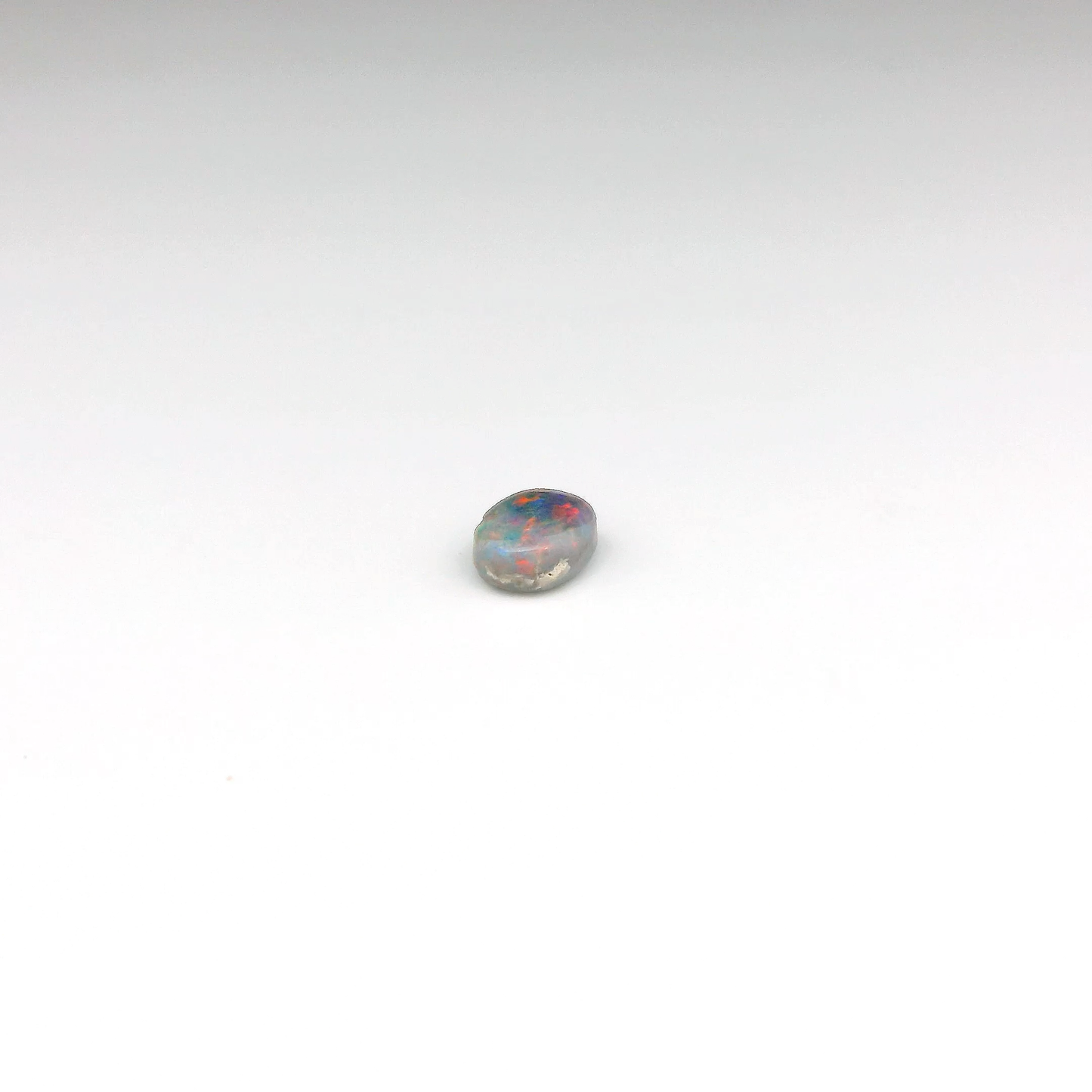 0.64ct Red Multicolour Opal Gemstone