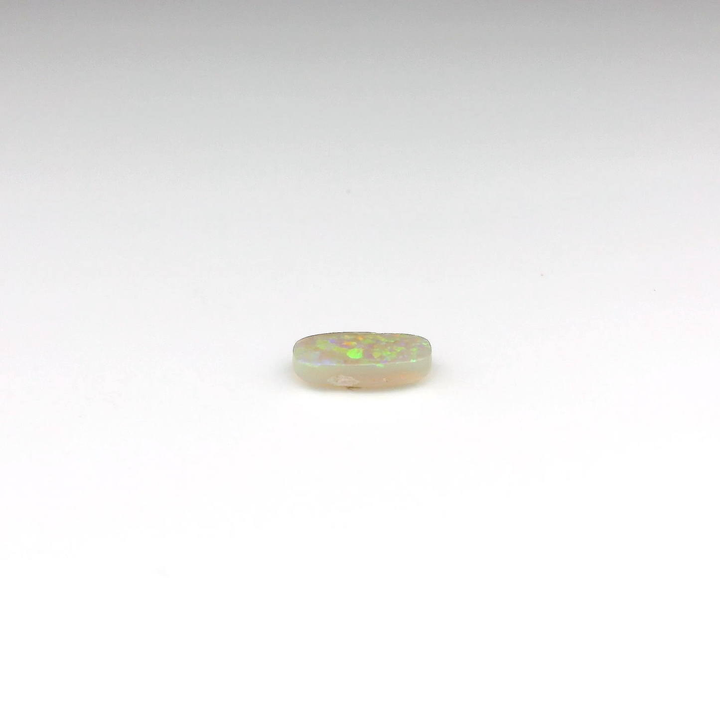 0.84ct Green, Orange Opal Gemstone