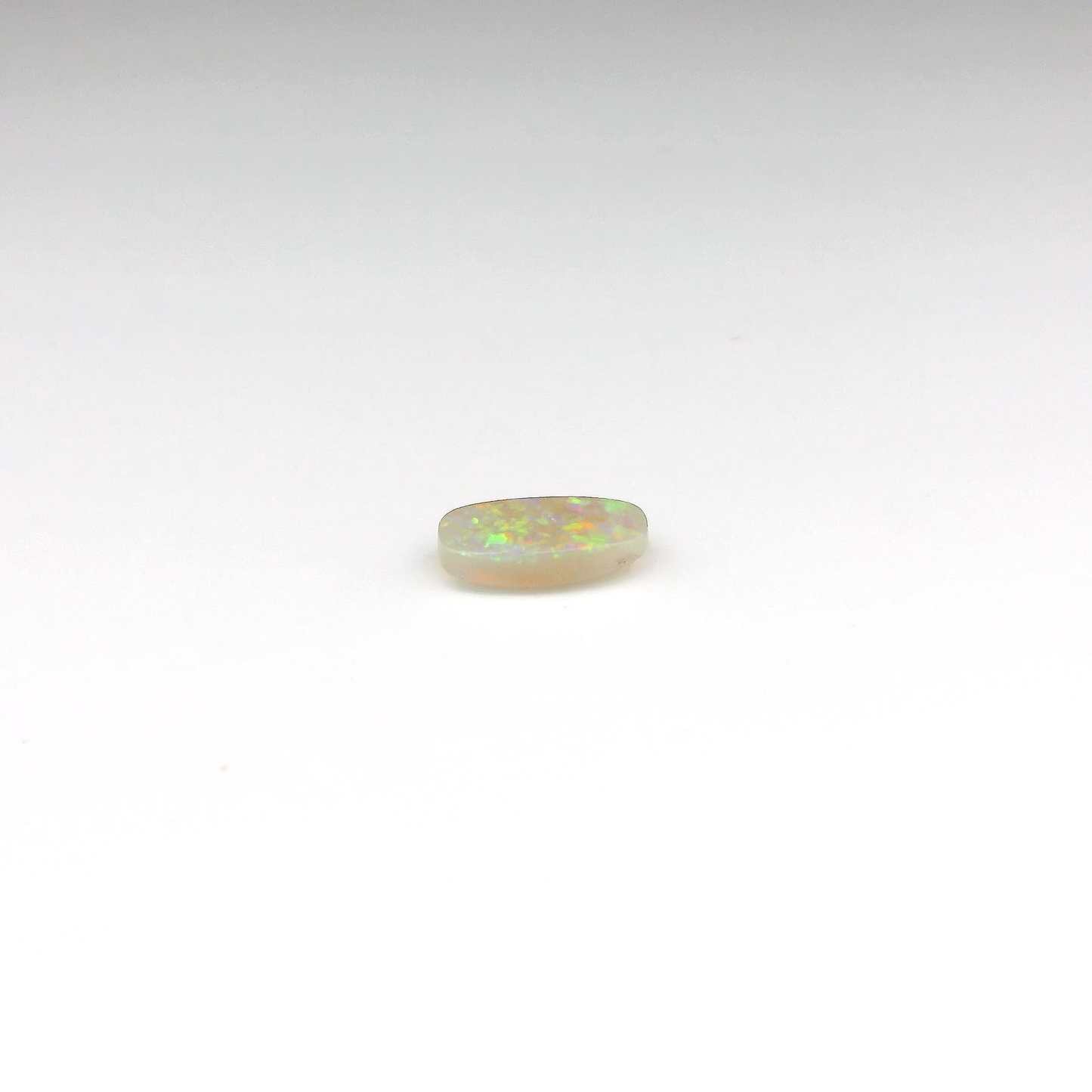 0.84ct Green, Orange Opal Gemstone