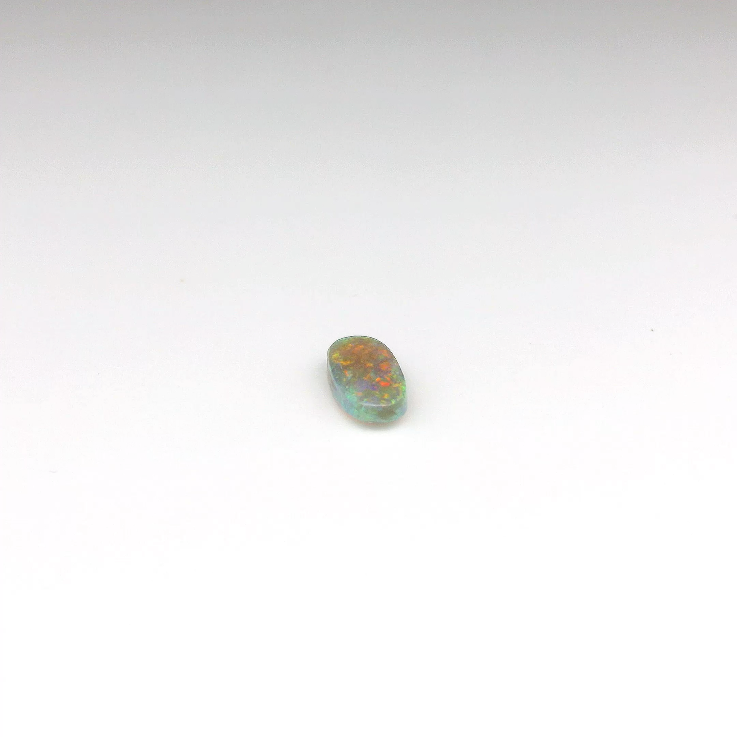 0.67ct Red, Orange Opal Gemstone