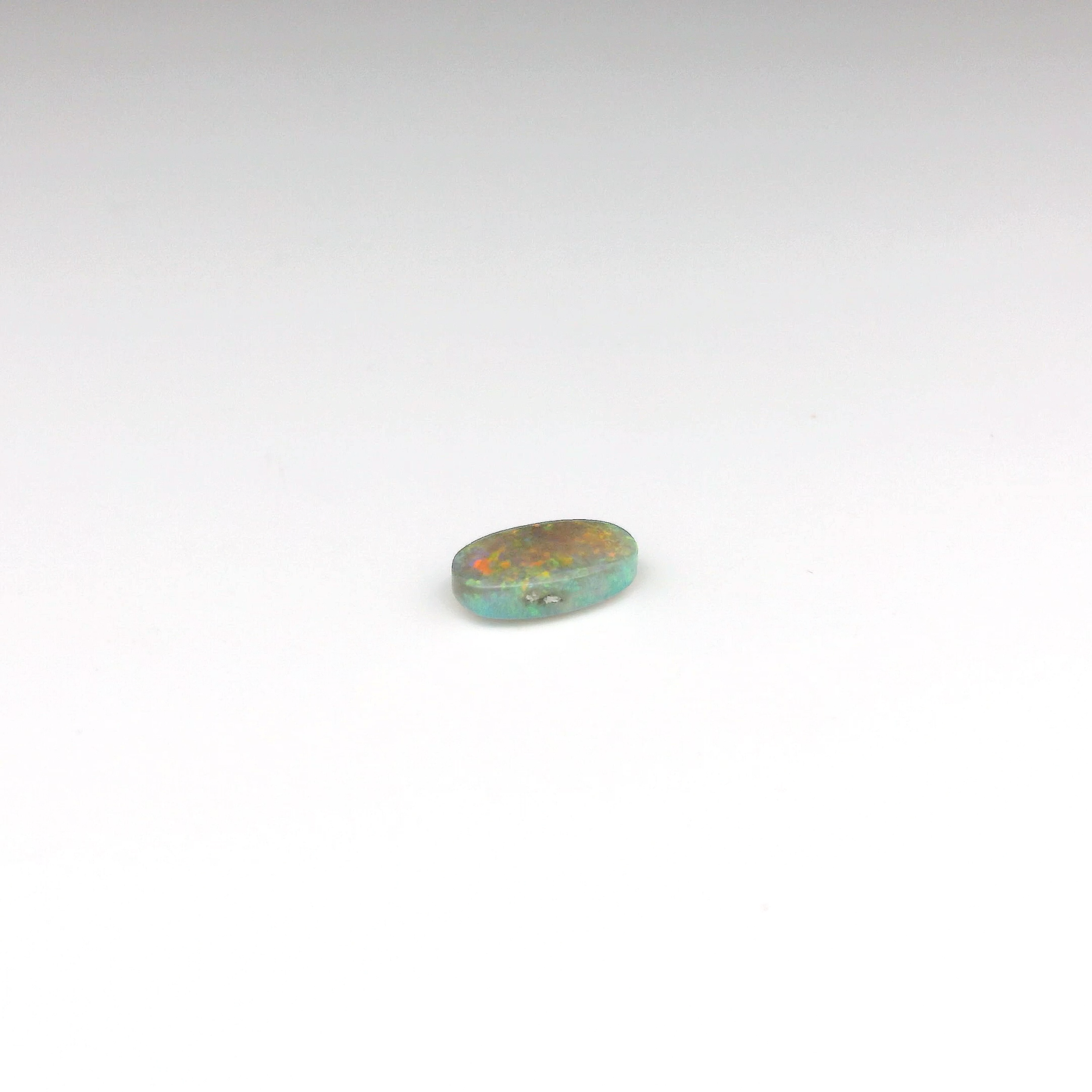 0.67ct Red, Orange Opal Gemstone