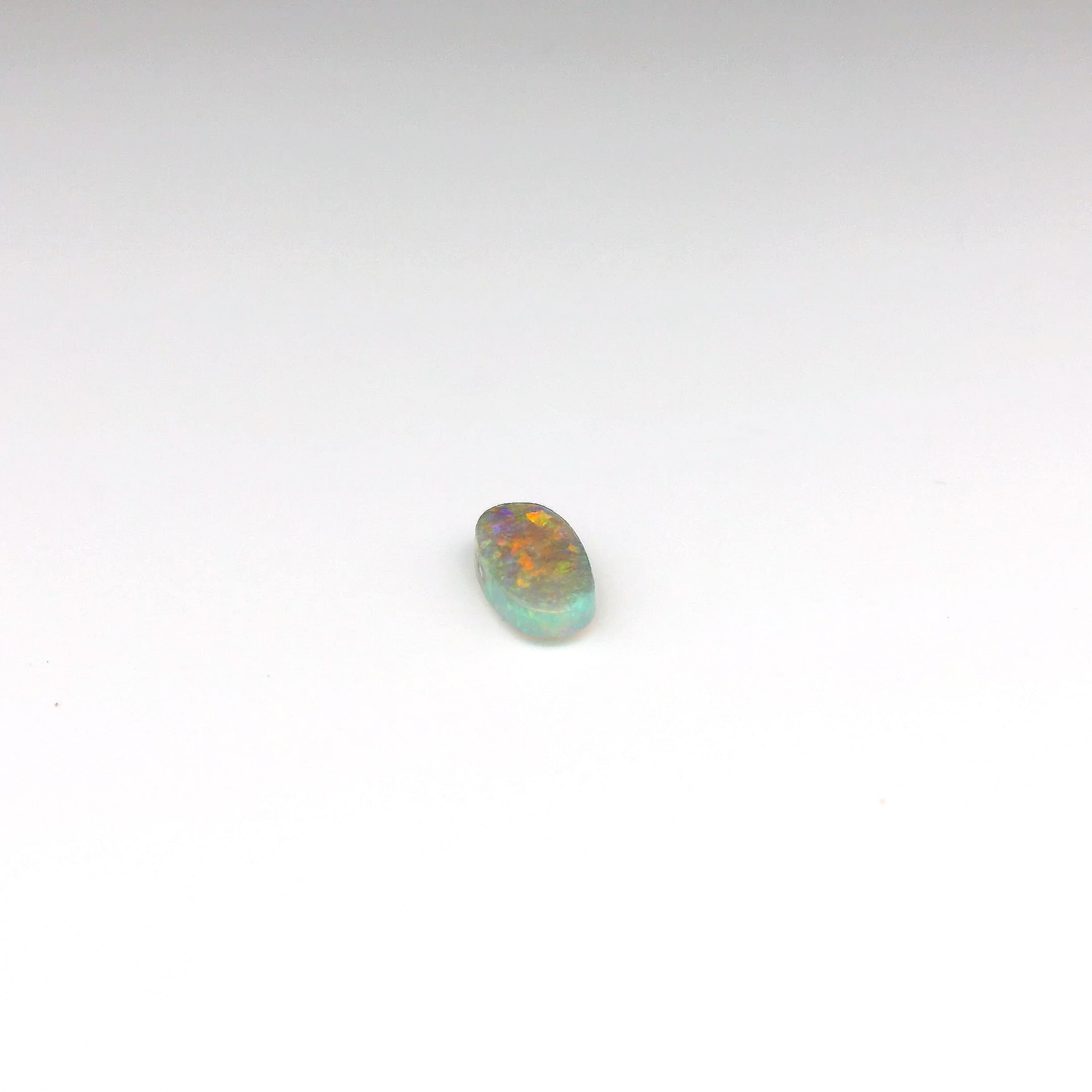 0.67ct Red, Orange Opal Gemstone