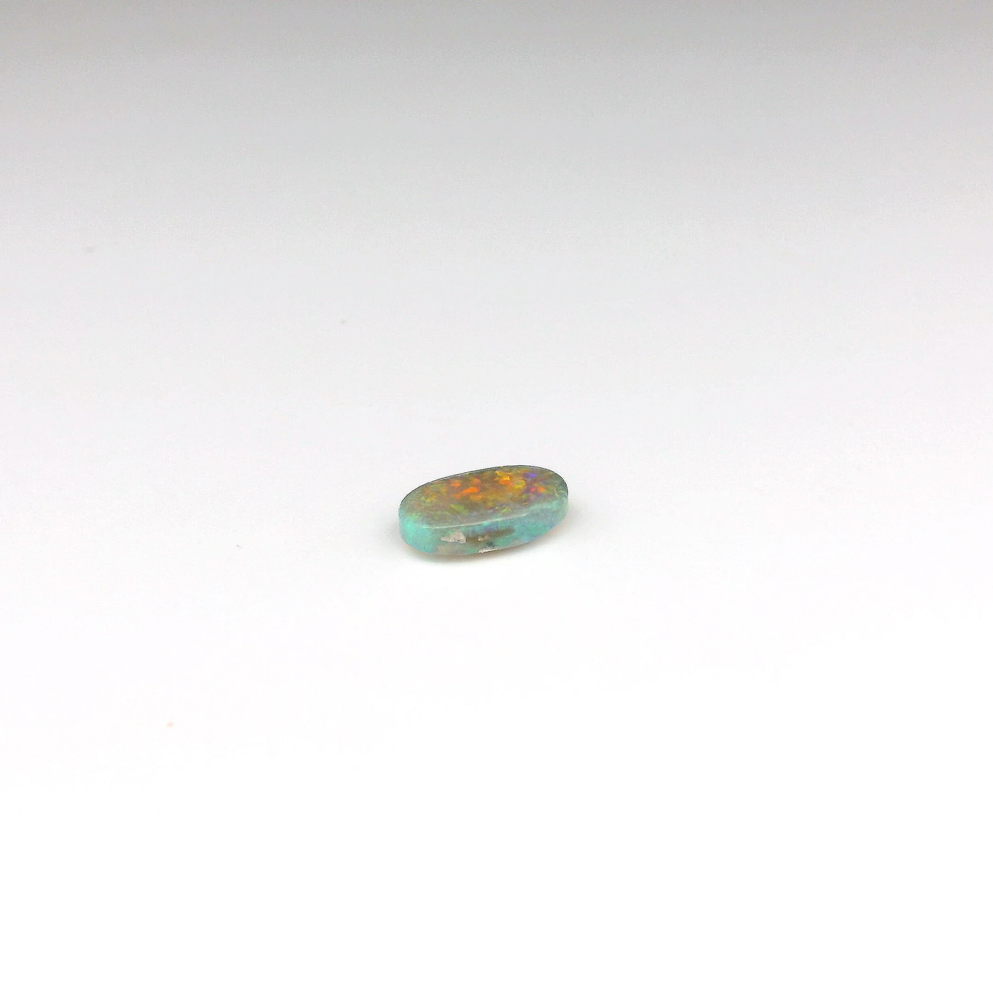 0.67ct Red, Orange Opal Gemstone