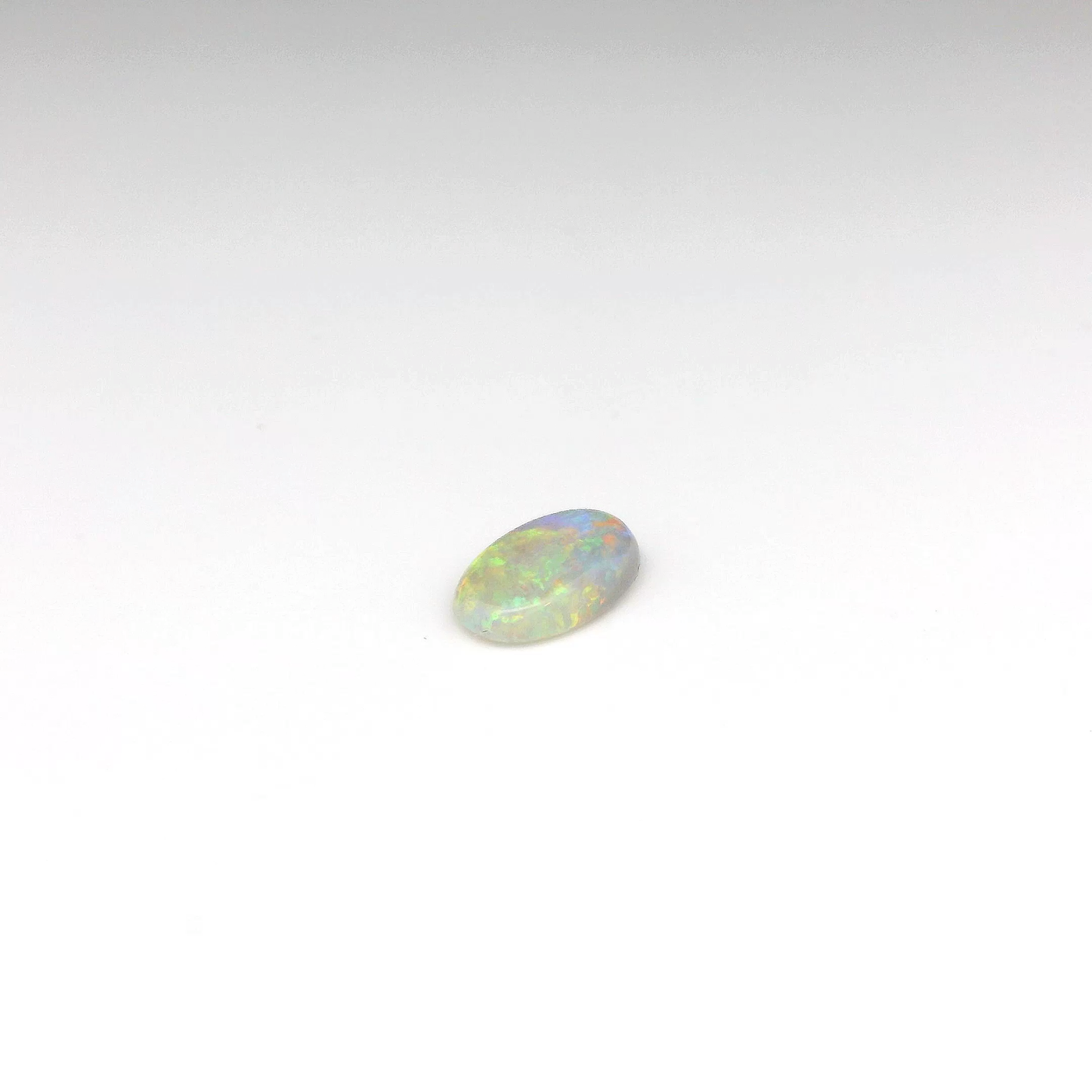 0.87ct Orange, Green Opal Gemstone
