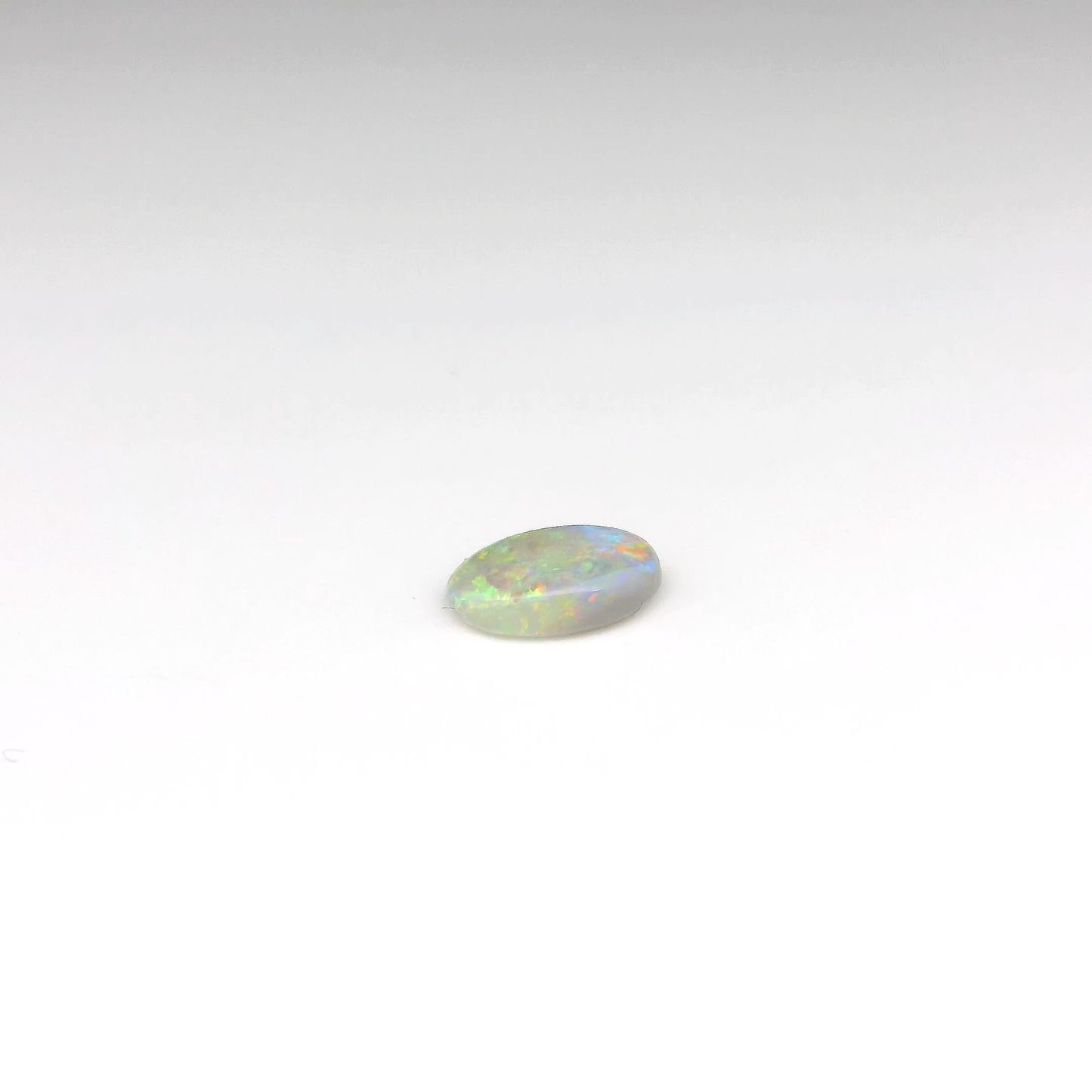 0.87ct Orange, Green Opal Gemstone