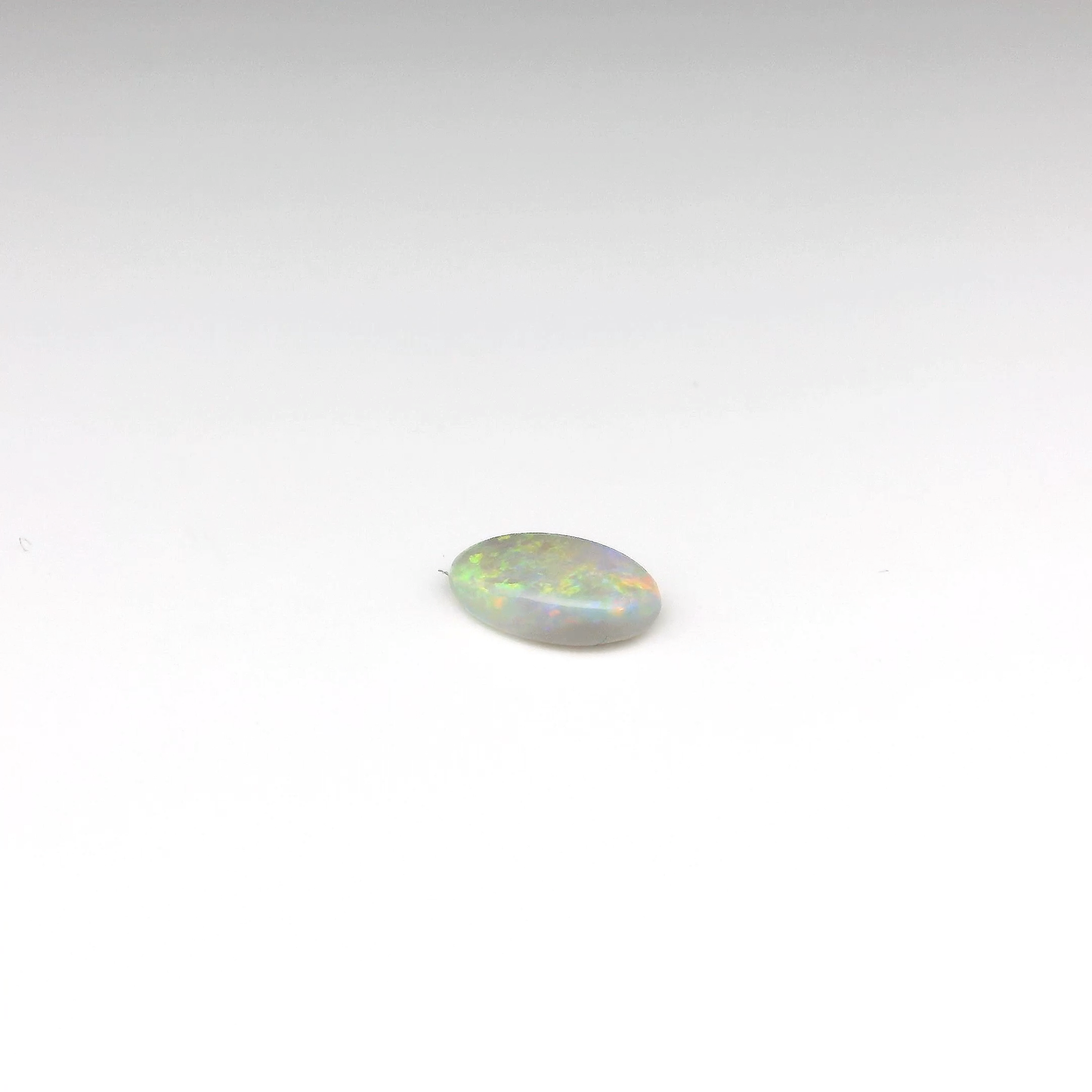 0.87ct Orange, Green Opal Gemstone