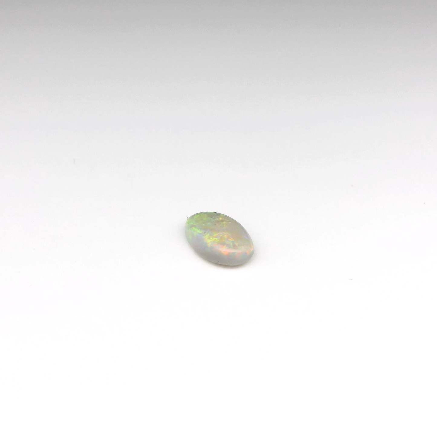 0.87ct Orange, Green Opal Gemstone